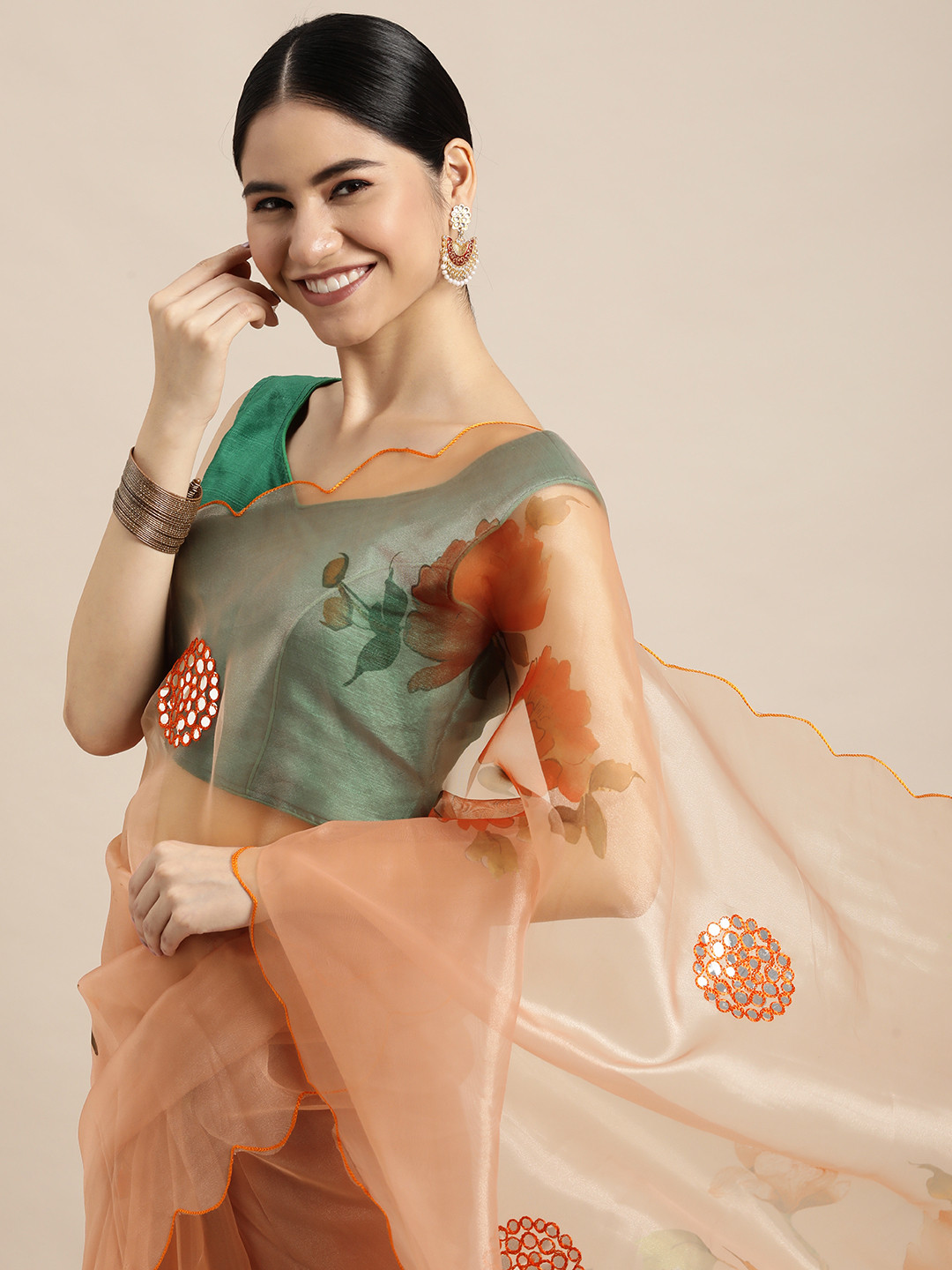 

VASTRANAND Orange & Green Floral Mirror Work Organza Saree