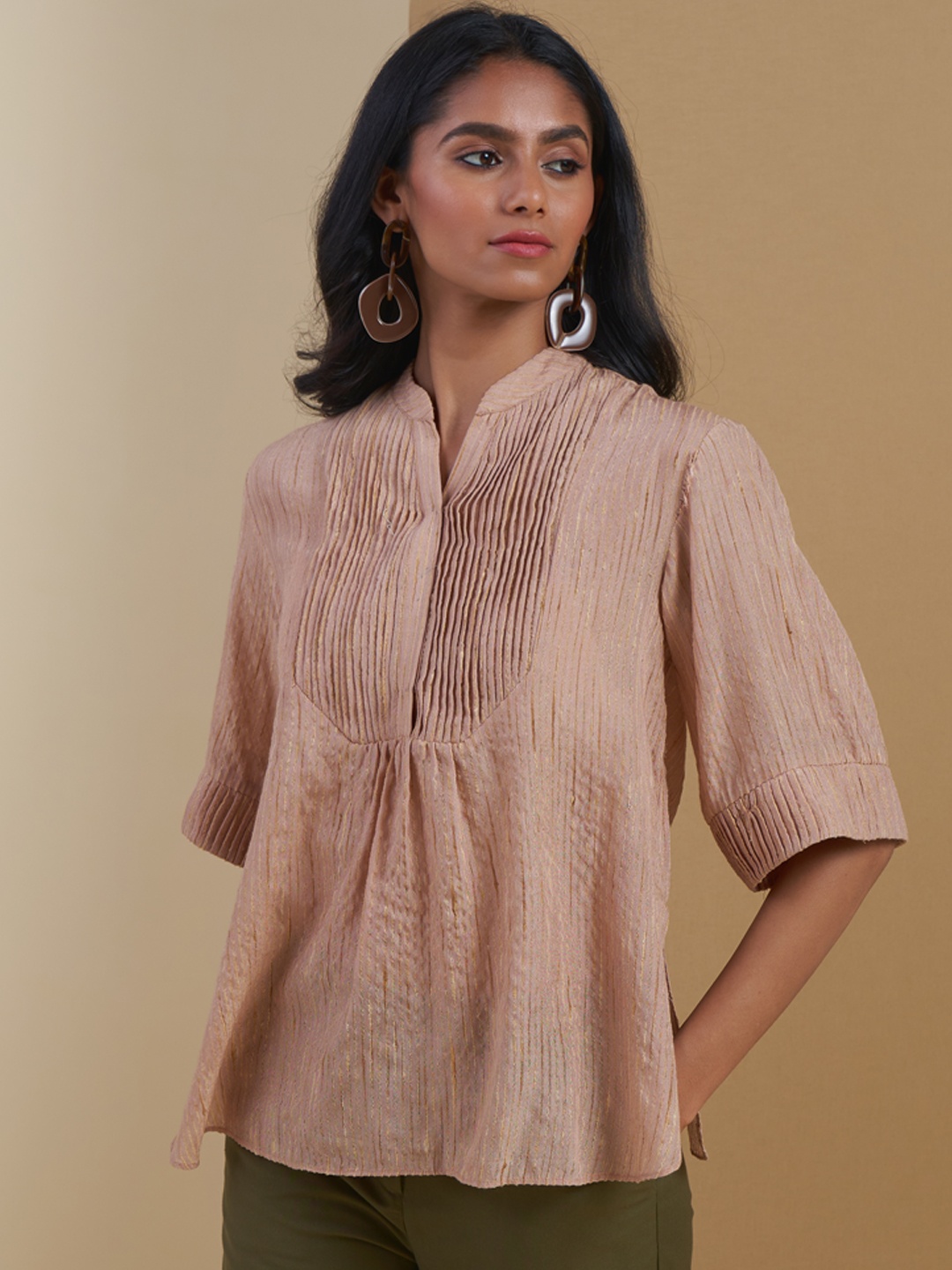 

Ritu Kumar Beige & Golden Striped Pure Cotton Pleated Kurti