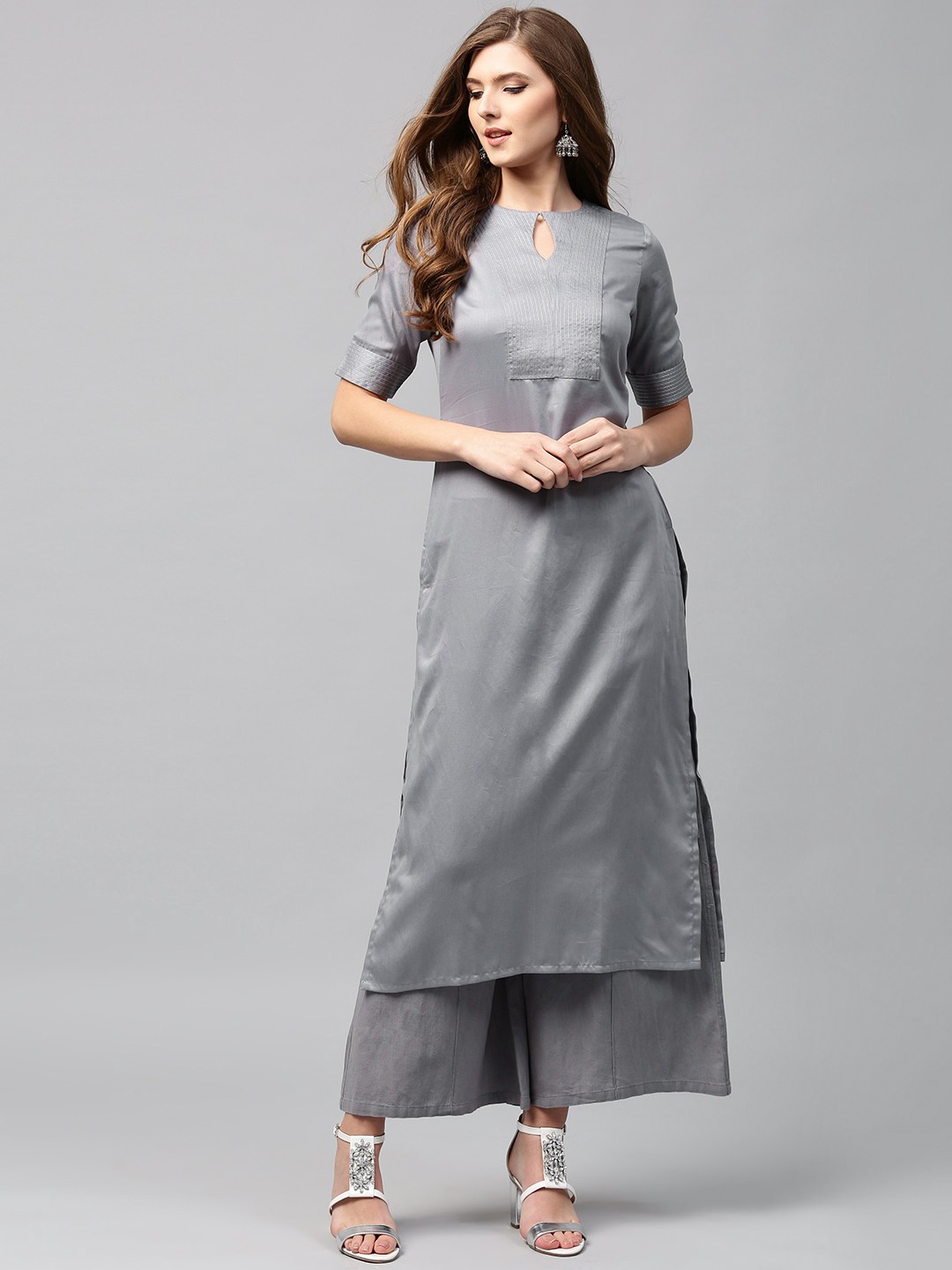 

Libas Women Grey Solid Straight Kurta