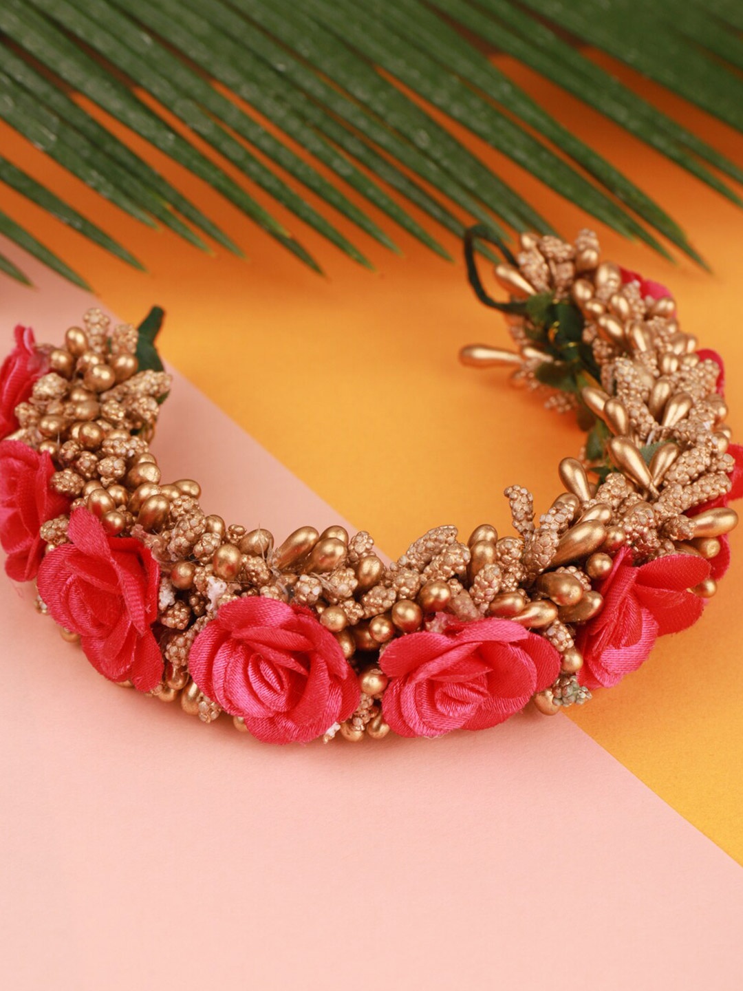 

Sanjog Women Pink & Gold-Toned Embellished Flower Juda Gajra Hair Accessory