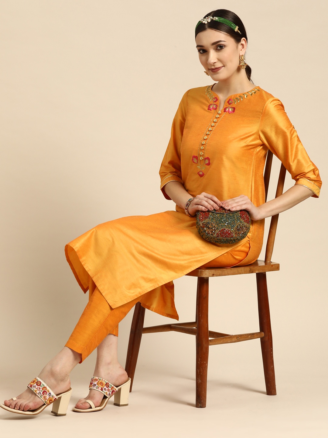 

Sangria Women Orange Ethnic Motifs Embroidered Kurta with Trousers