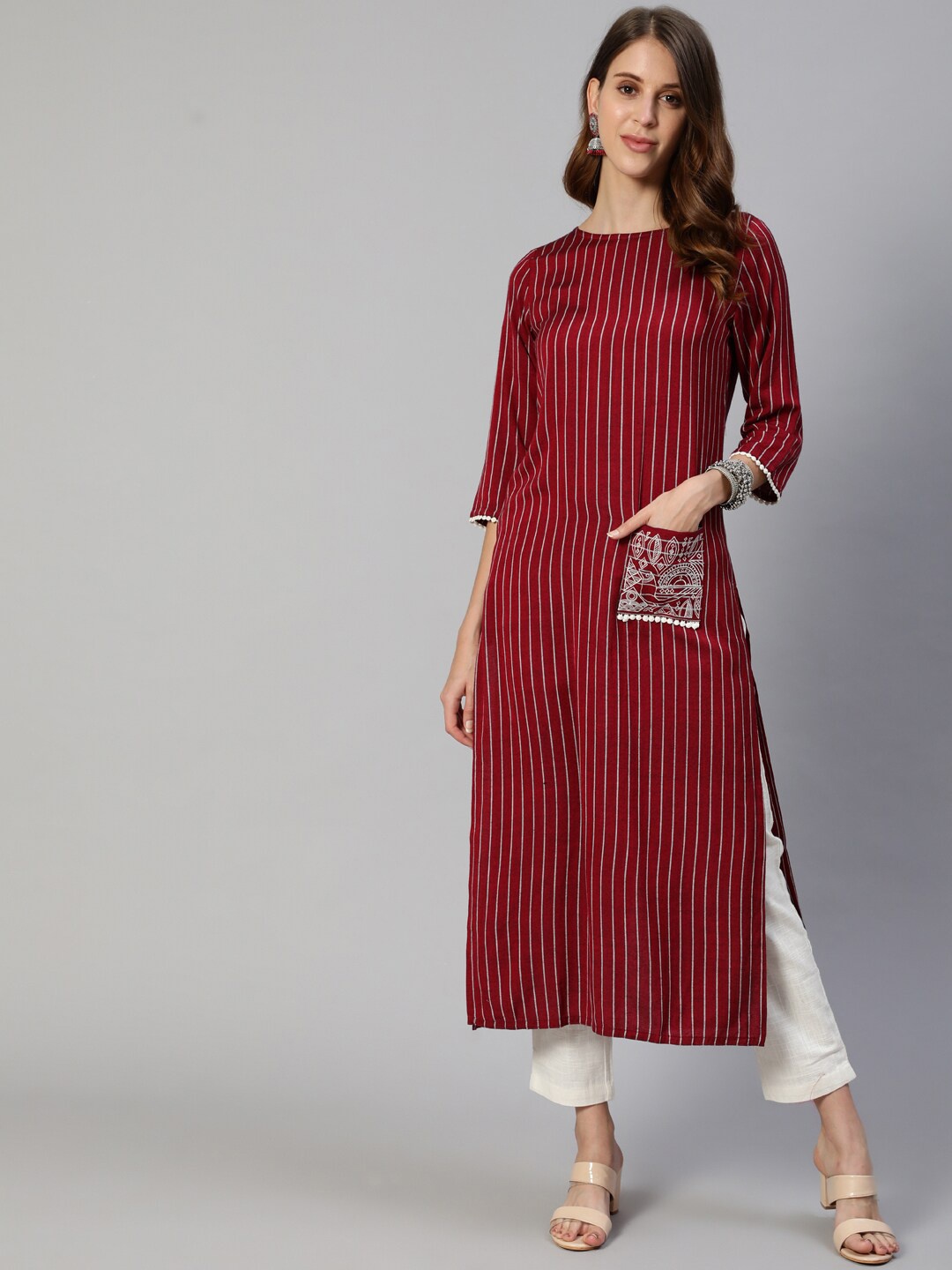 

Jaipur Kurti Women Maroon Striped Kurti with Trousers