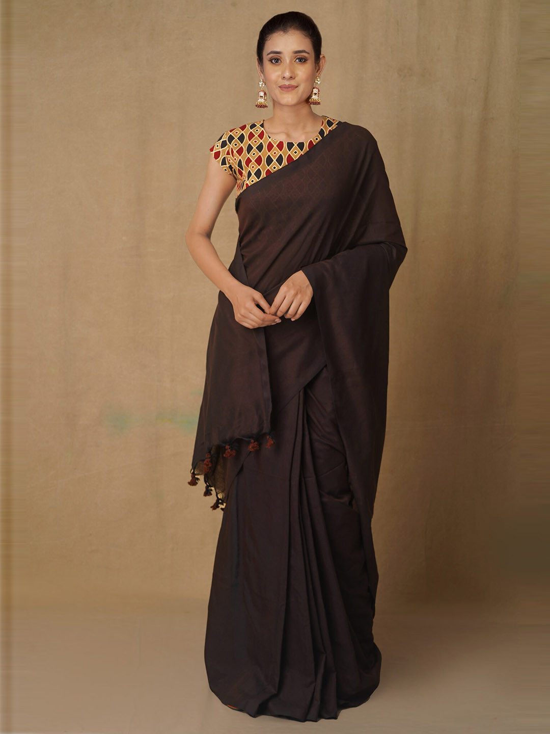 

Unnati Silks Brown Pure Linen Jamdani Saree