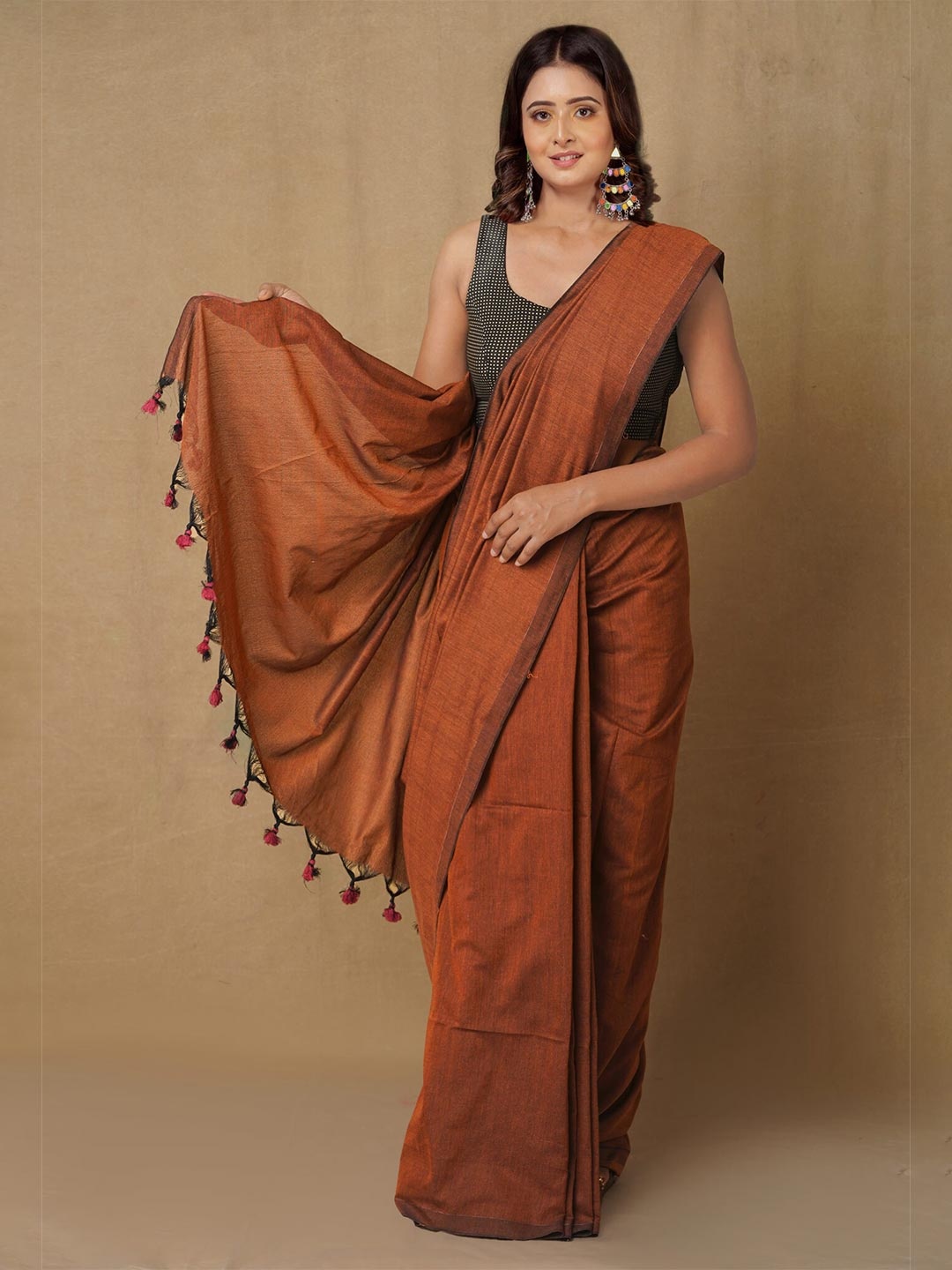 

Unnati Silks Brown & Pink Pure Linen Handloom Jamdani Saree