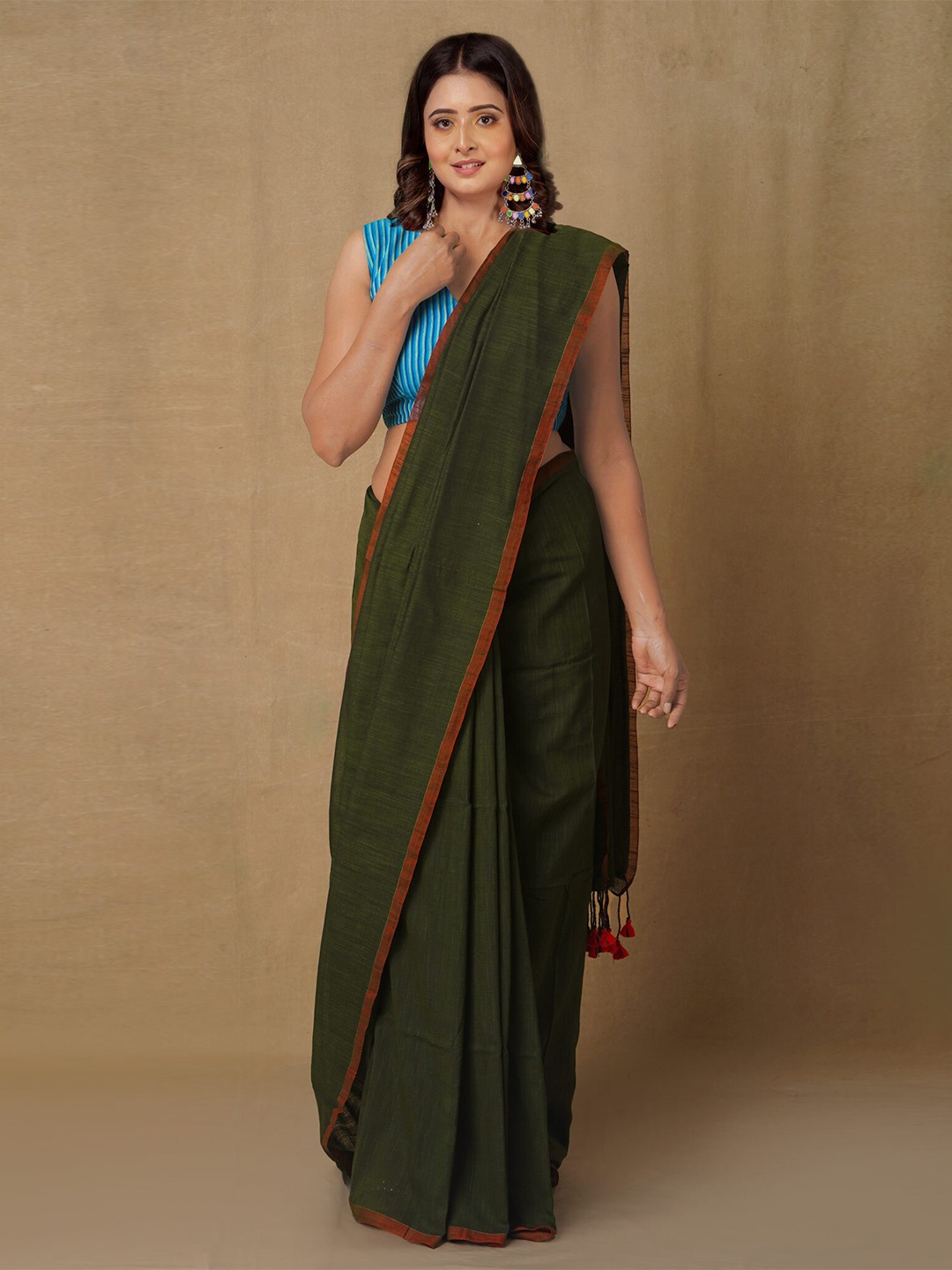 

Unnati Silks Green Woven Design Pure Linen Handloom Jamdani Saree