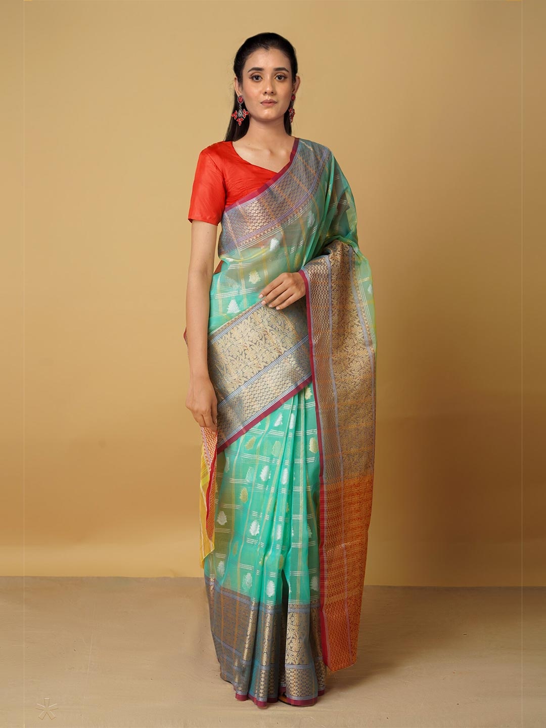 

Unnati Silks Green & Gold-Toned Woven Design Silk Cotton Banarasi Saree
