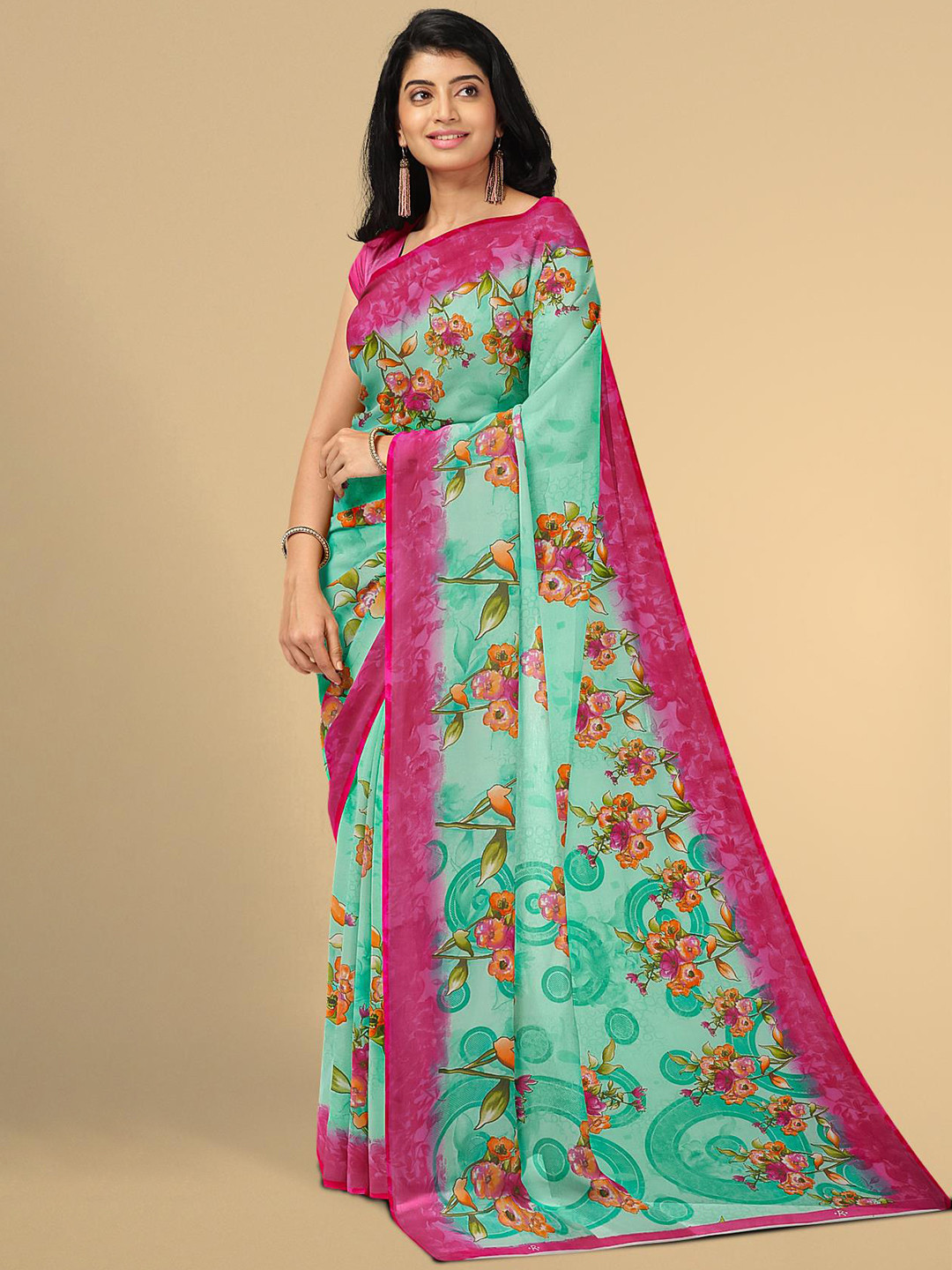 

Kalamandir Sea Green & Pink Floral Saree