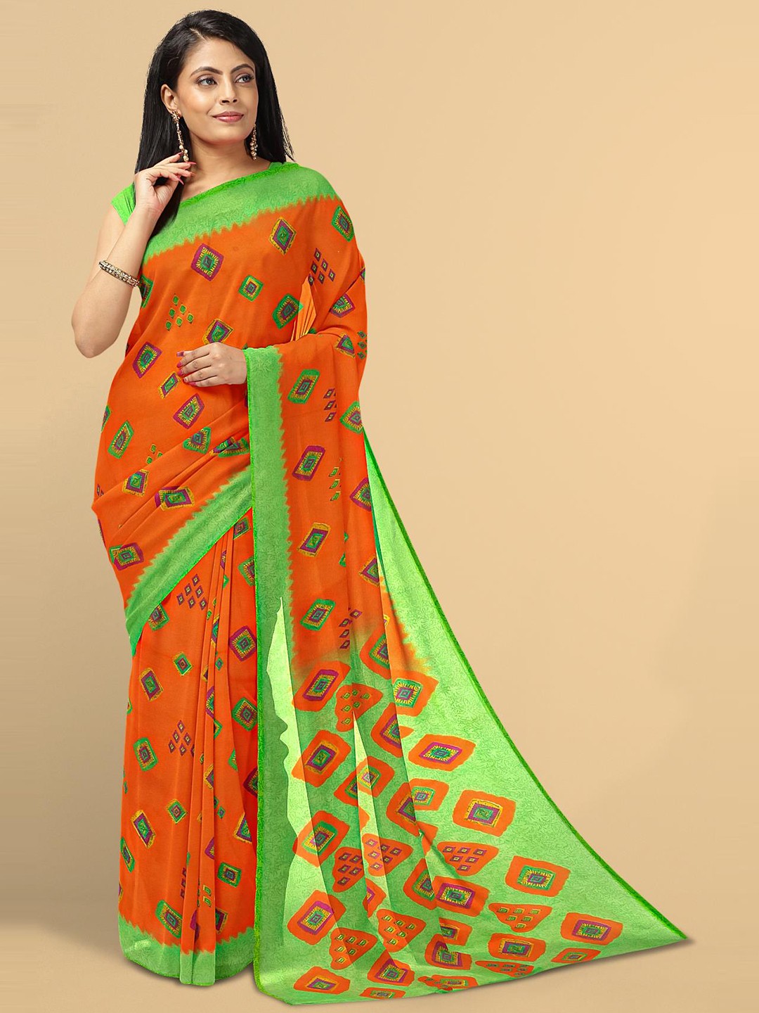 

Kalamandir Orange & Green Saree