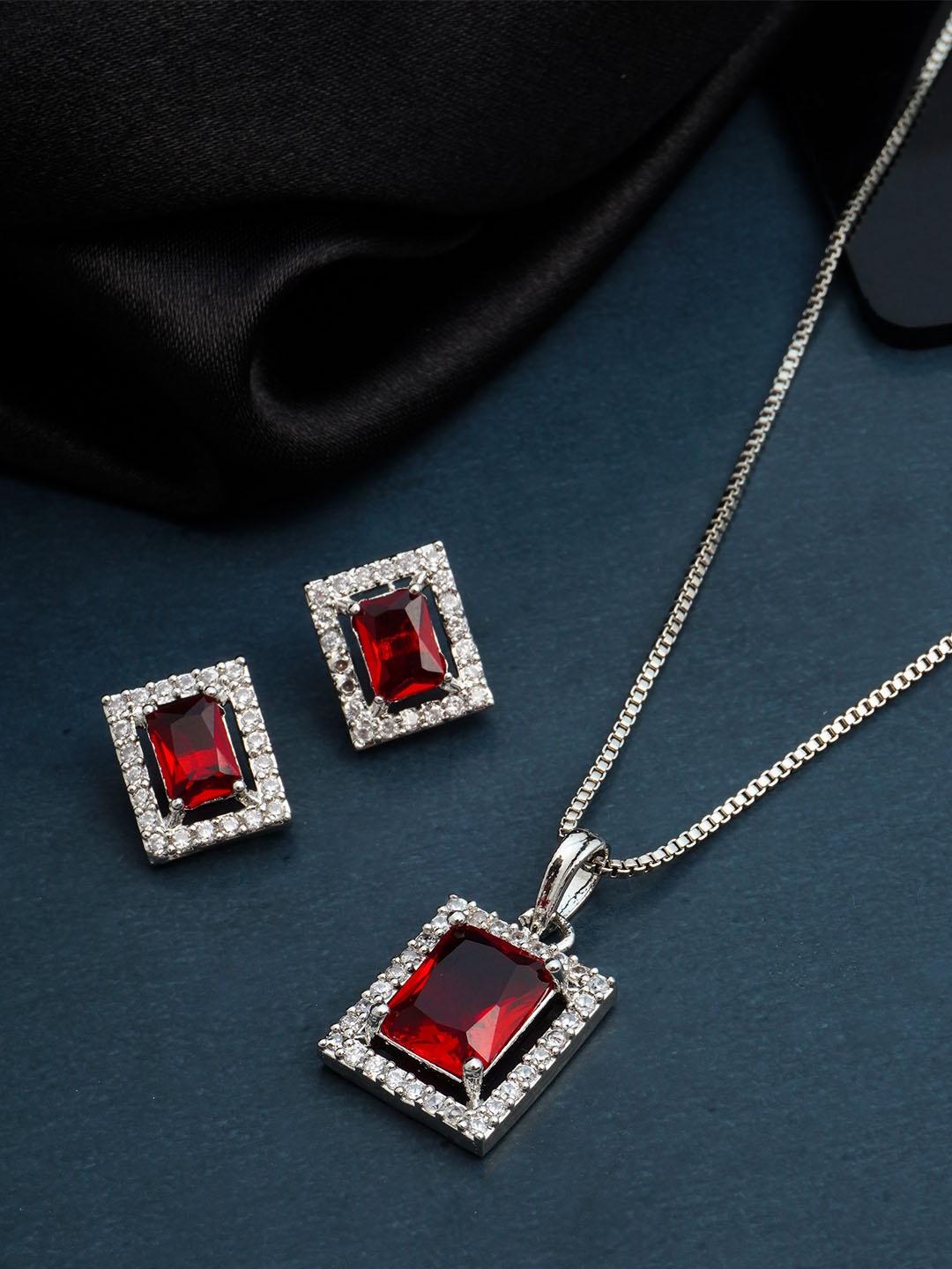 

Urmika Women Red & Silver-Toned Stone-Studded Necklace With Earrings
