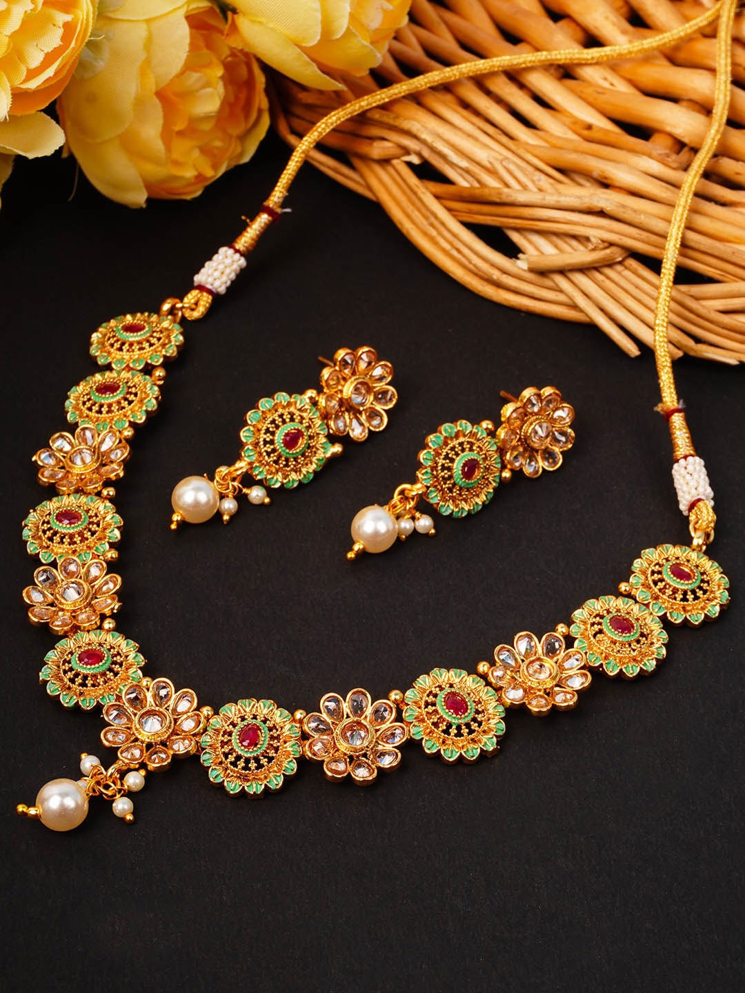 

Urmika Gold-Toned Pink & Green Stone Studded Floral Jewellery Set