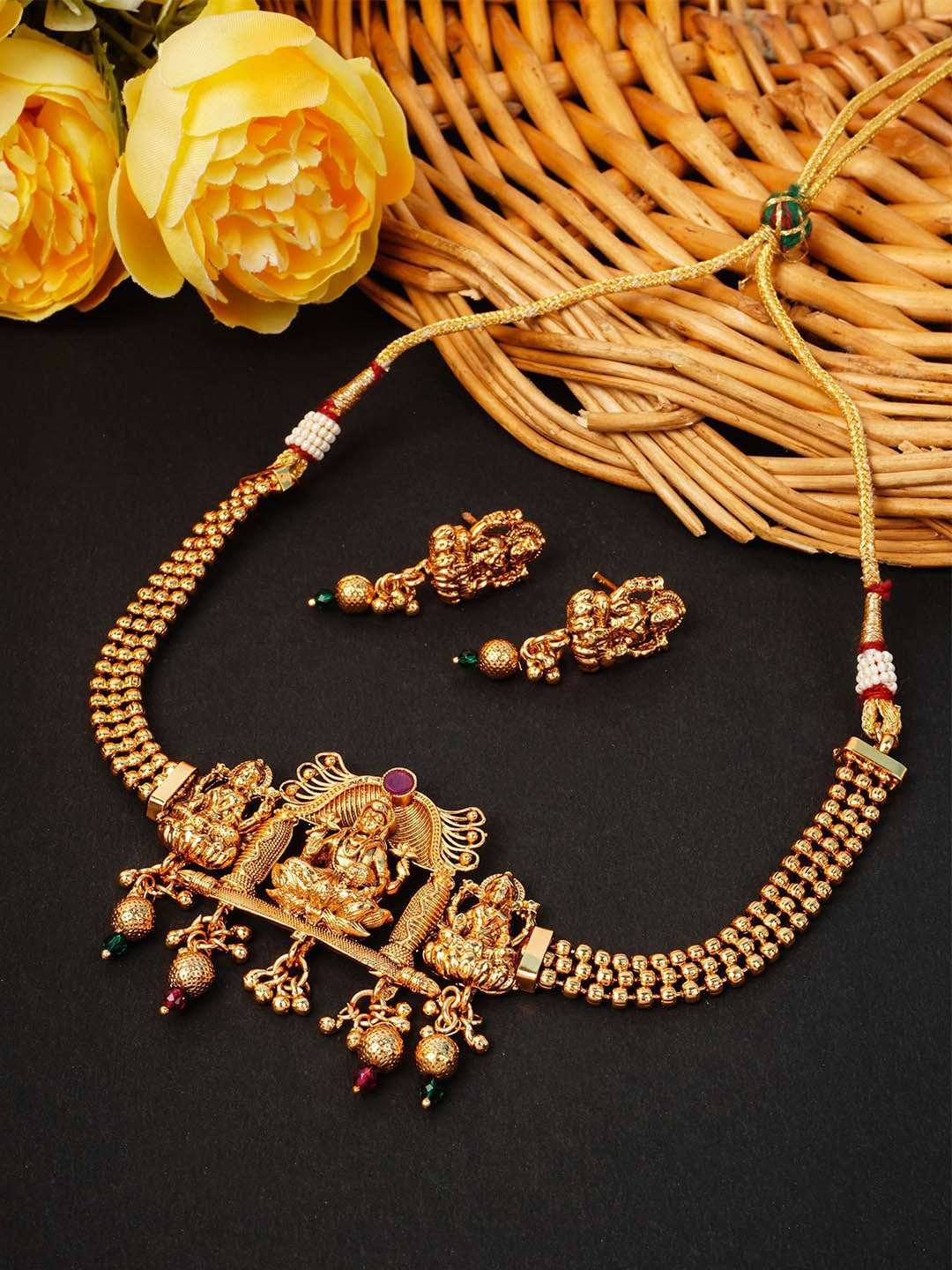 

Urmika Gold-Toneded Red & Green Stone-Studded Goddess Lakshmi Temple Jewellery Set