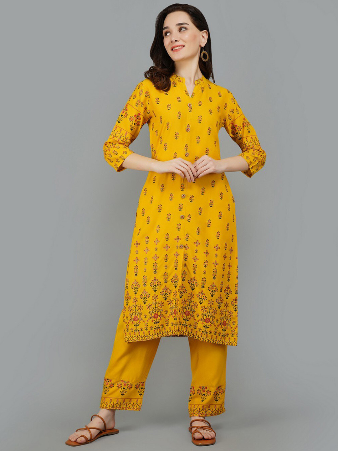 

ADAA JAIPUR Women Mustard Yellow Floral Printed Kurti with Trousers