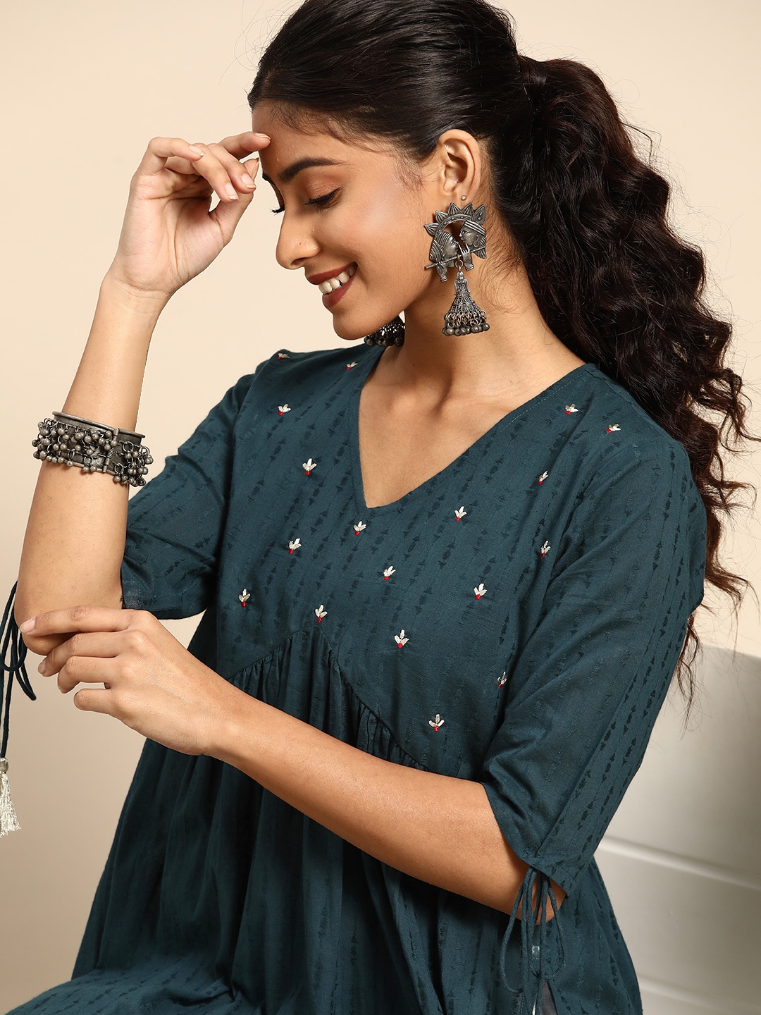 

Sangria Women Teal Ethnic Motifs Embroidered Thread Work Kurta