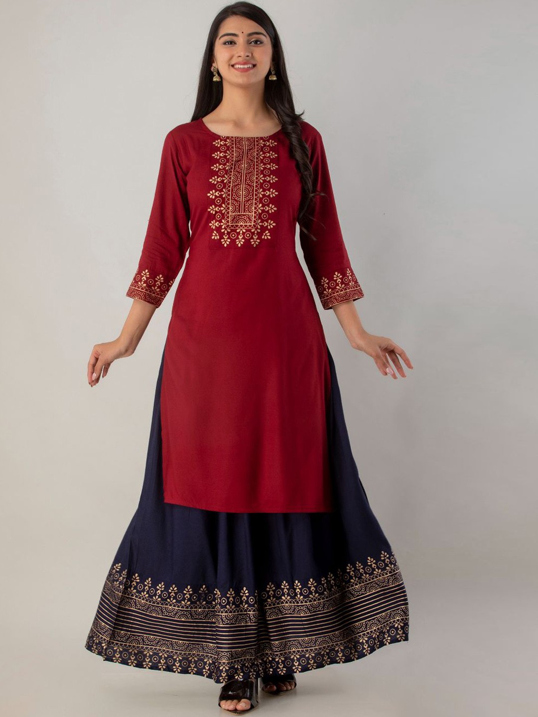 

FABISTA Women Maroon Floral Embroidered Layered Kurti with Skirt