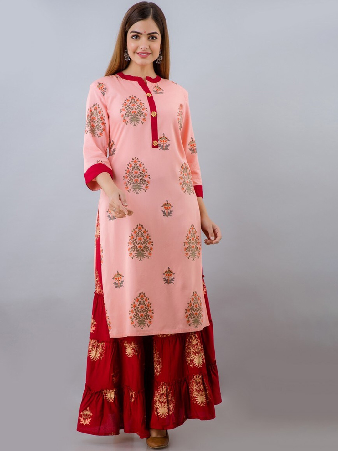 

FABISTA Women Peach-Coloured Ethnic Motifs Printed Panelled Kurti with Skirt