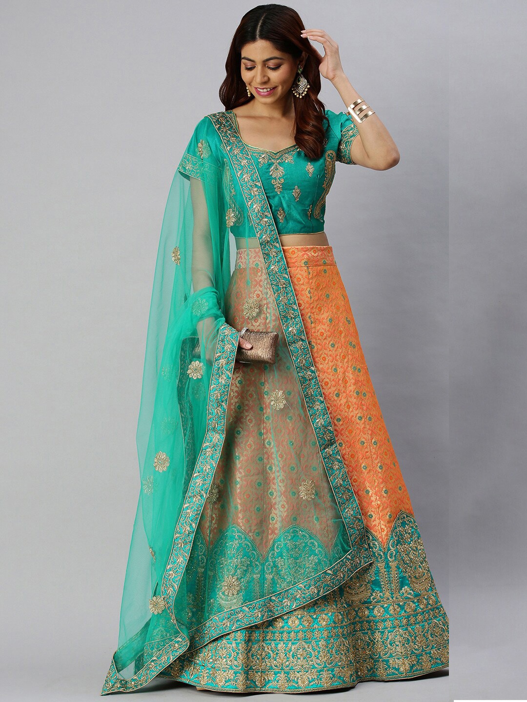 

SHADOW & SAINING Peach-Coloured & Green Embroidered Semi-Stitched Lehenga Unstitched Blouse With Dupatta