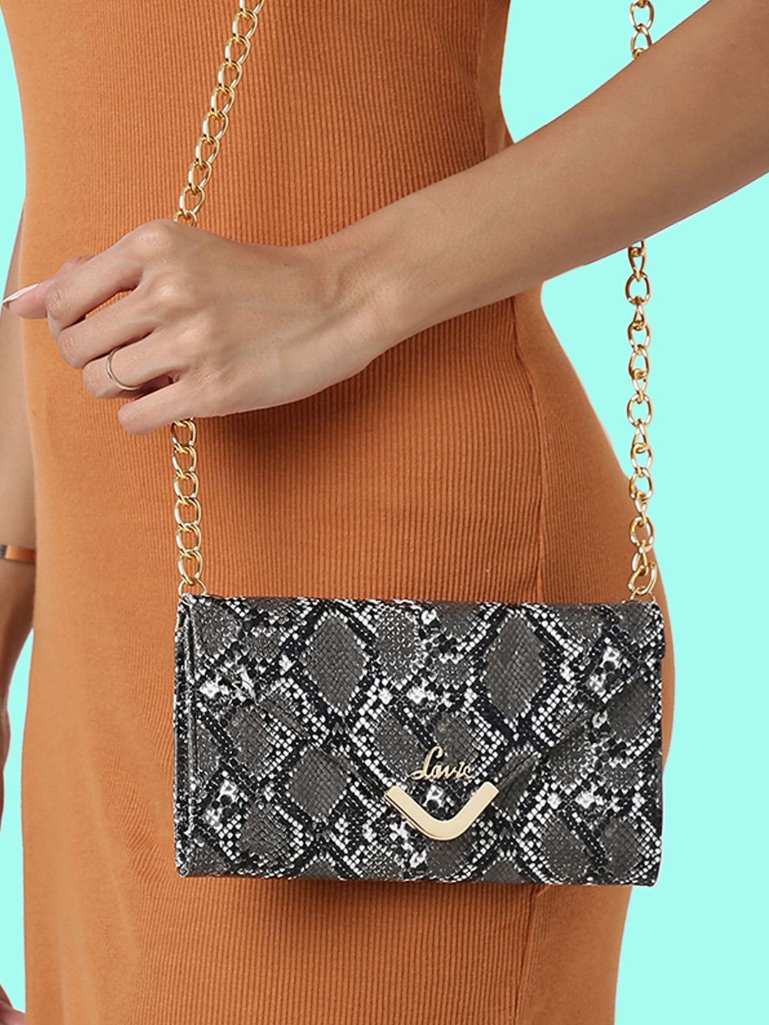 

Lavie Glint Black Animal Textured Structured Party Sling Bag