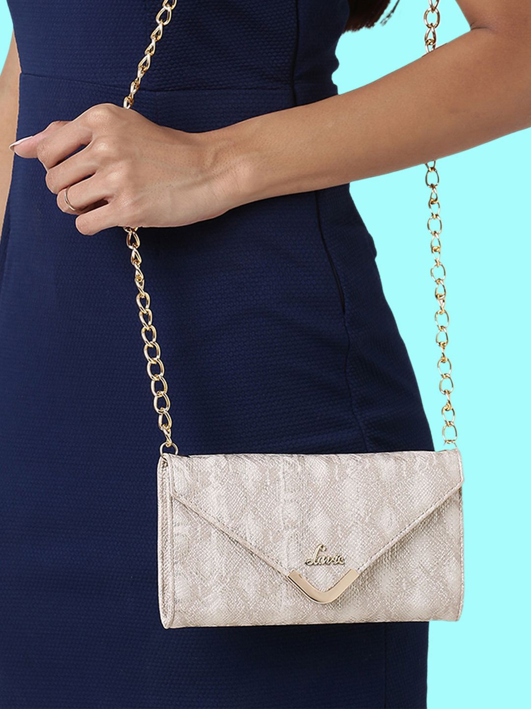 

Lavie Glint Gold-Toned Textured Structured Party Sling Bag