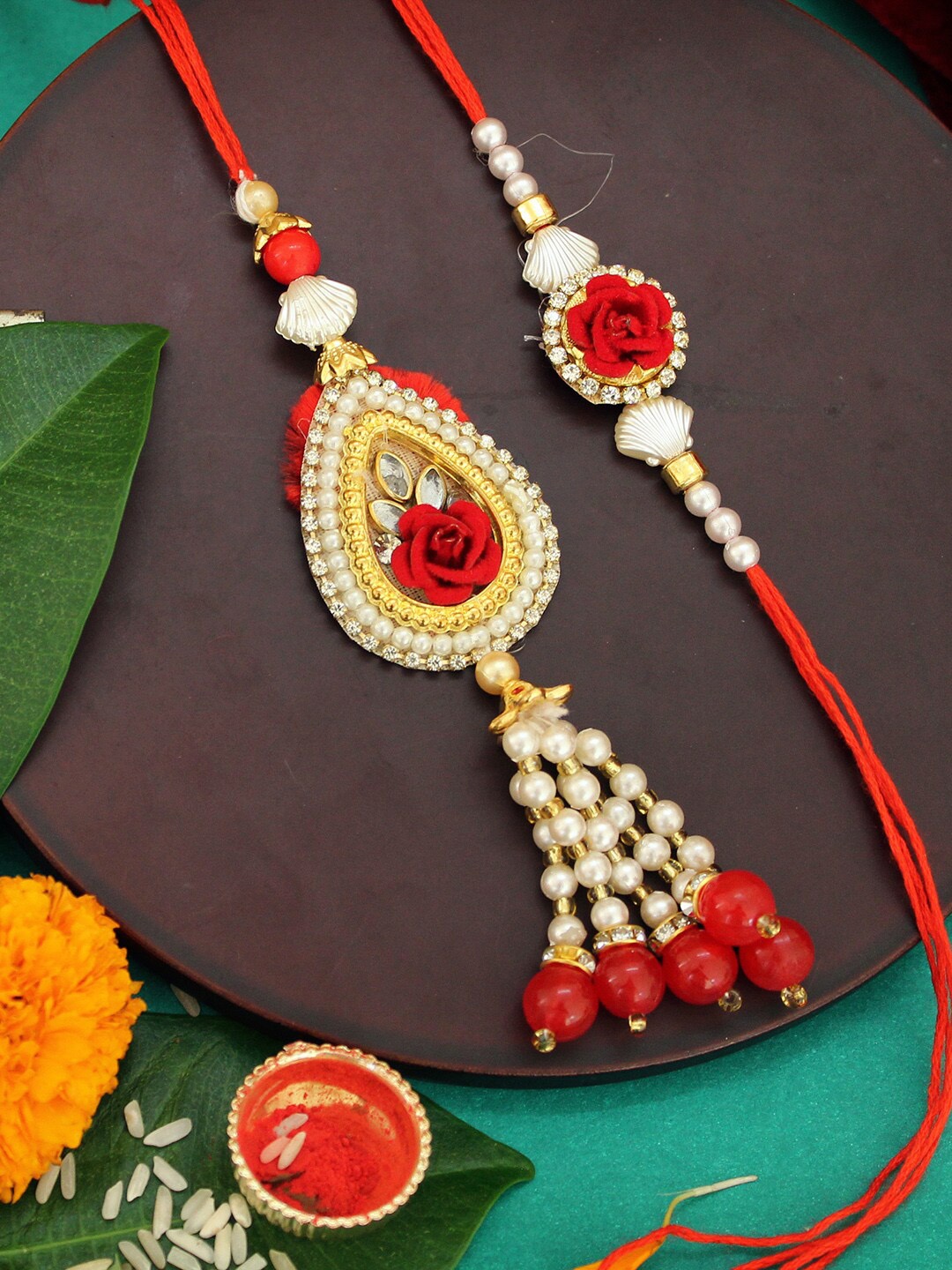 

TIED RIBBONS Set Of 2 Gold-Toned & Red Designed Rakhi