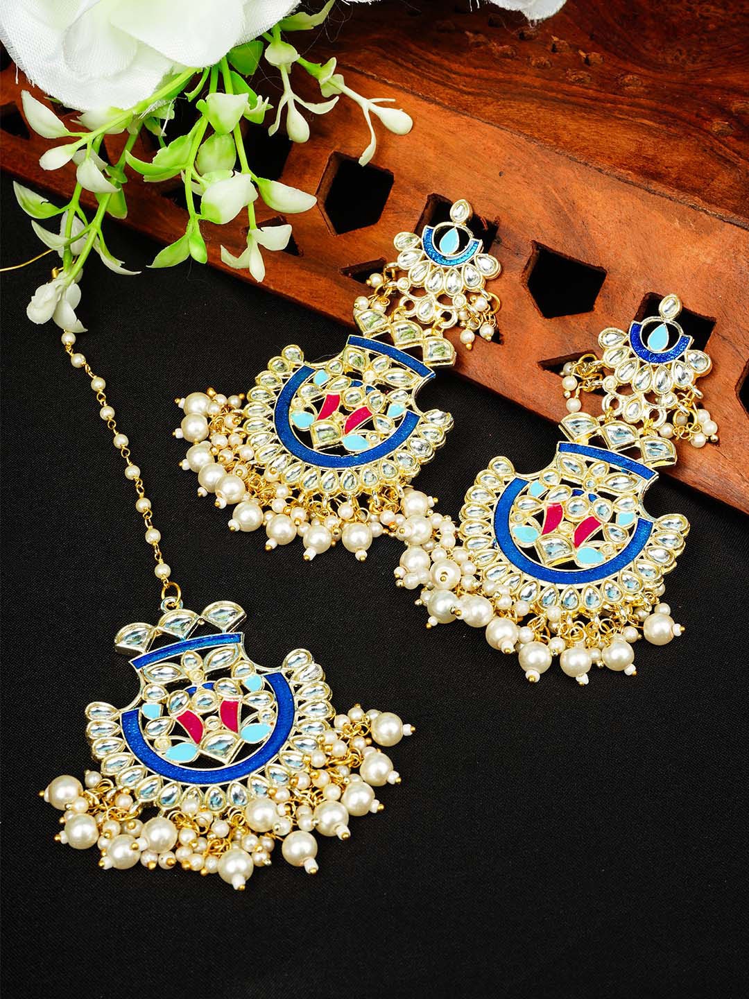 

Urmika Women Blue & Cream-Coloured Classic Jhumkas Earrings & Maang Tika Set