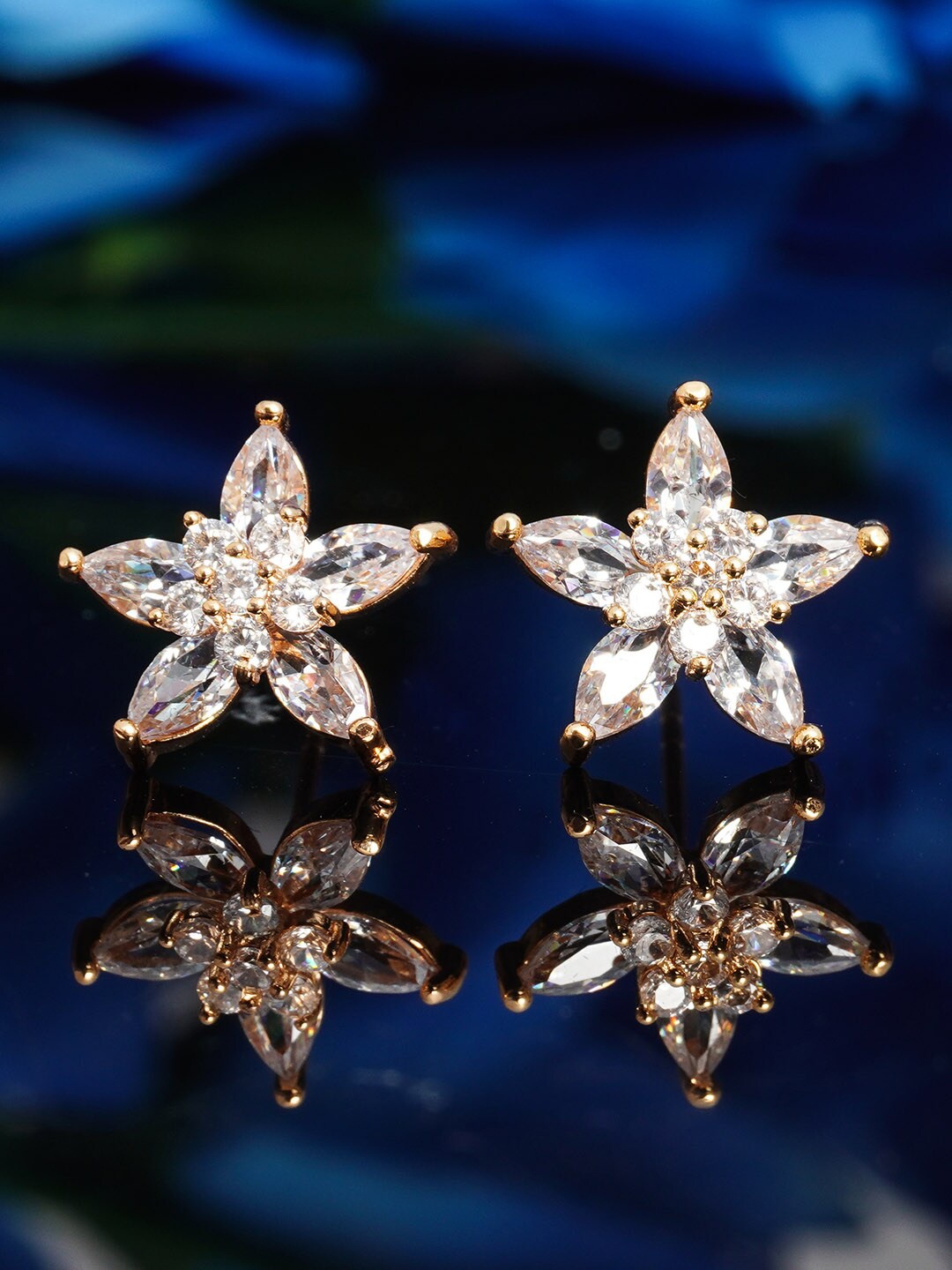 

Urmika Gold-Toned Star Shaped Studs Earrings