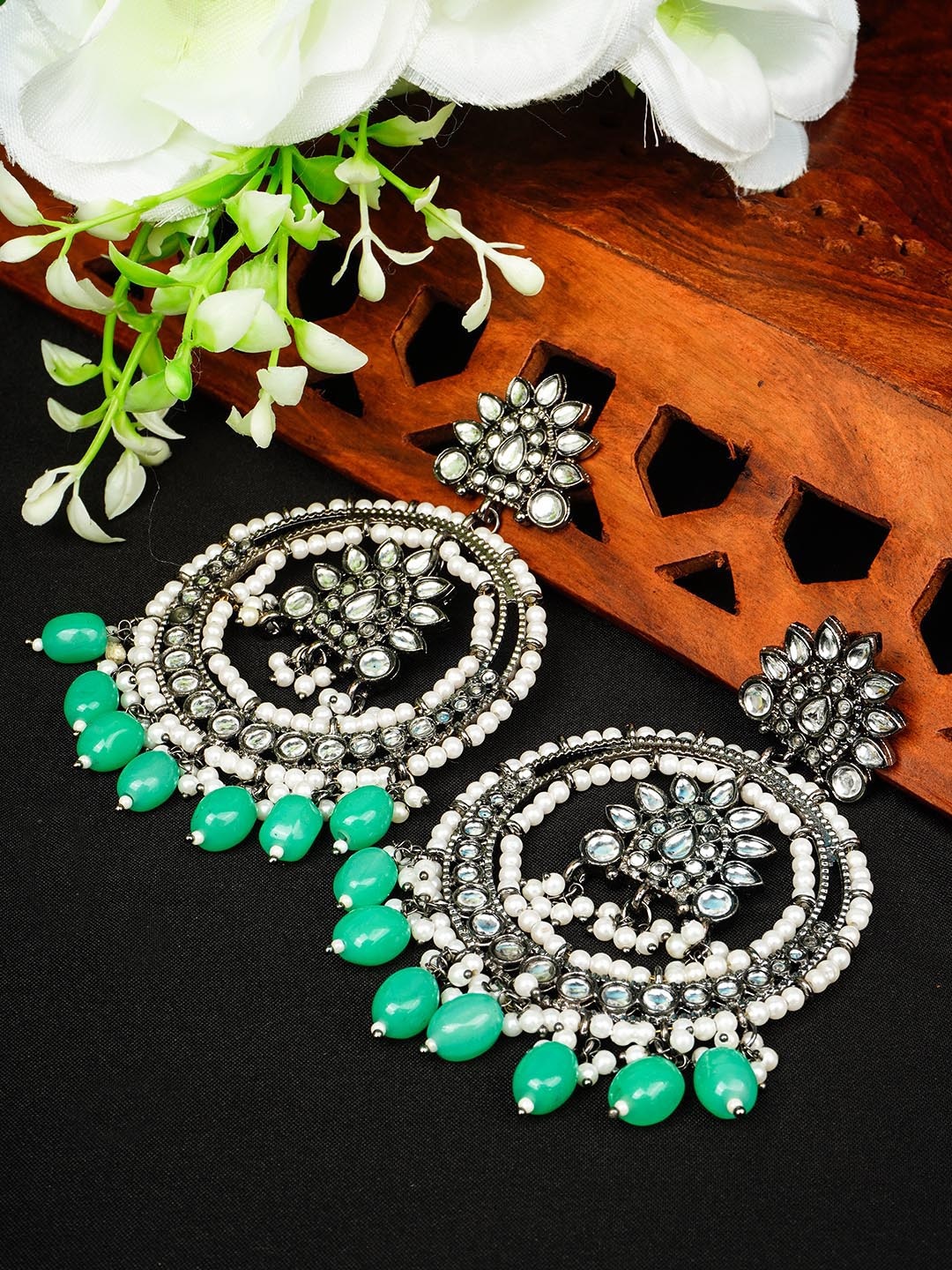 

Urmika Green Circular Chandbalis Earrings