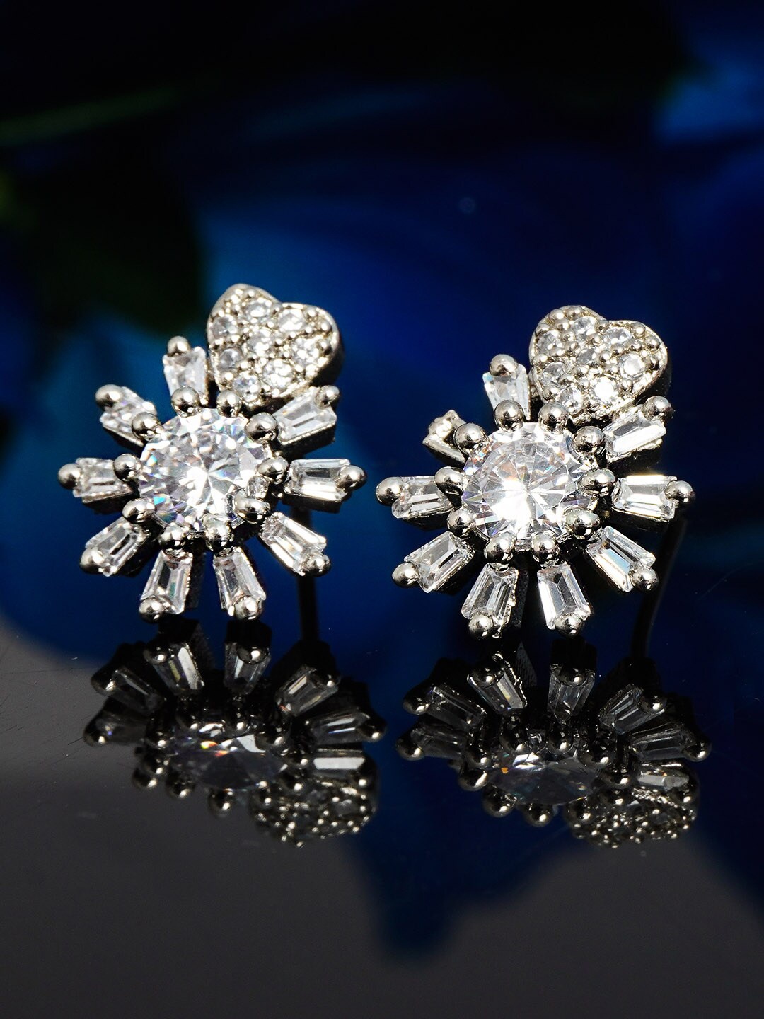 

Urmika White Floral Studs Earrings