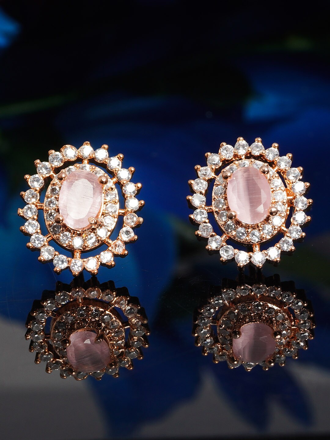 

Urmika Pink Oval Studs Earrings