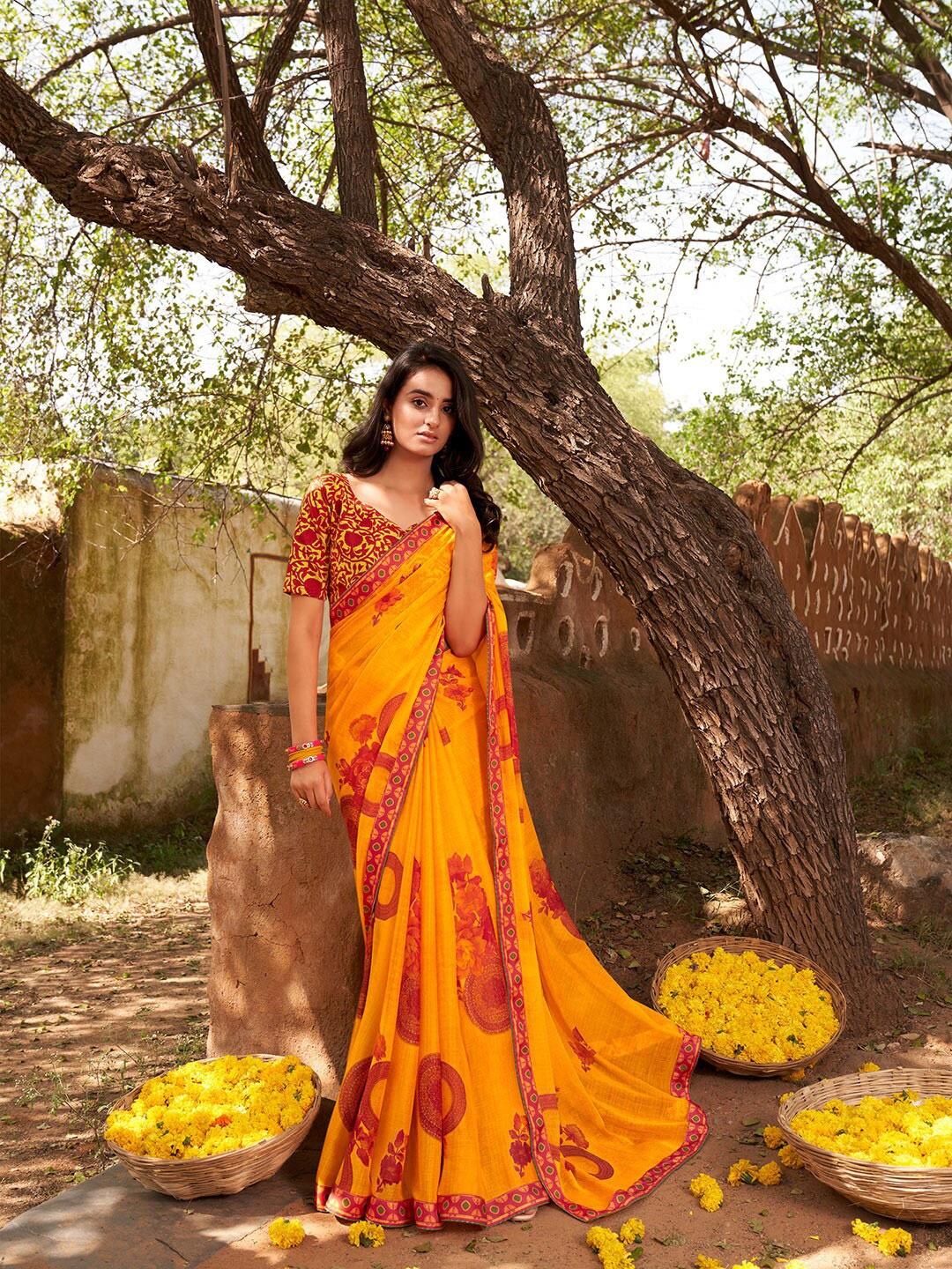 

Shaily Yellow & Maroon Floral Pure Chiffon Saree