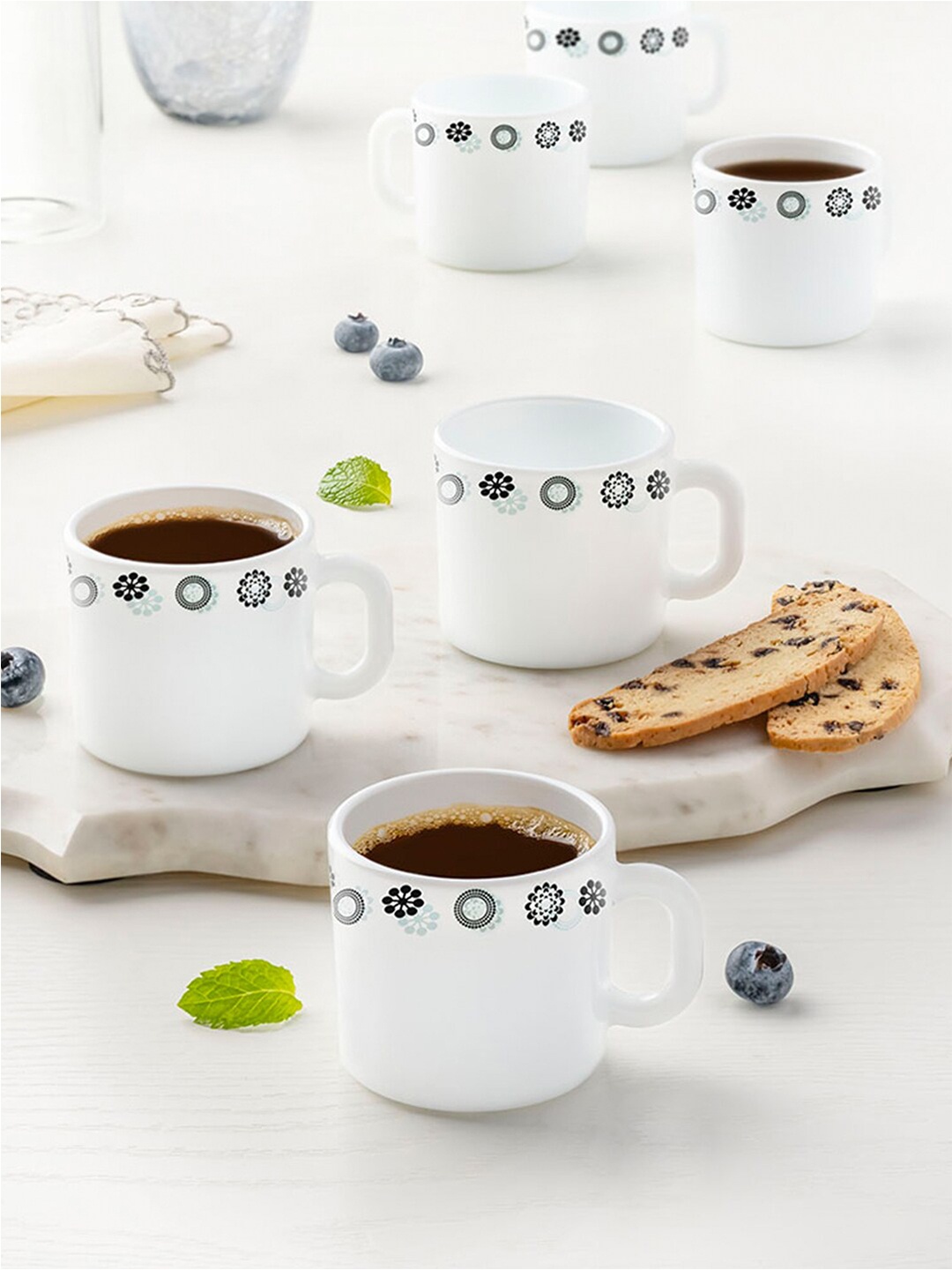 

Larah by BOROSIL White & Black Printed Opalware Glossy Mugs Set of Cups and Mugs