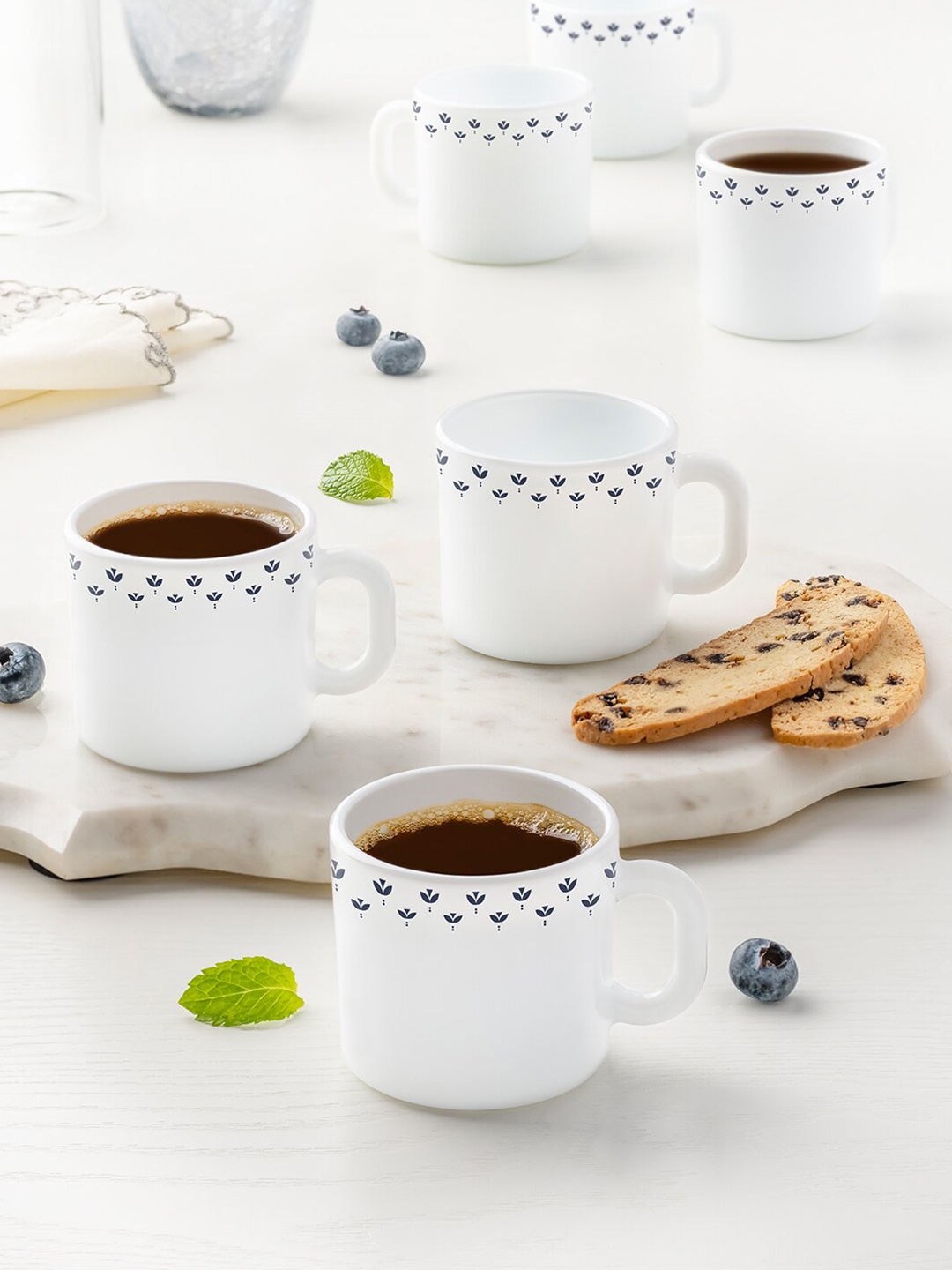 

Larah by BOROSIL White & Blue Printed Opalware Glossy Mugs Set of Cups and Mugs