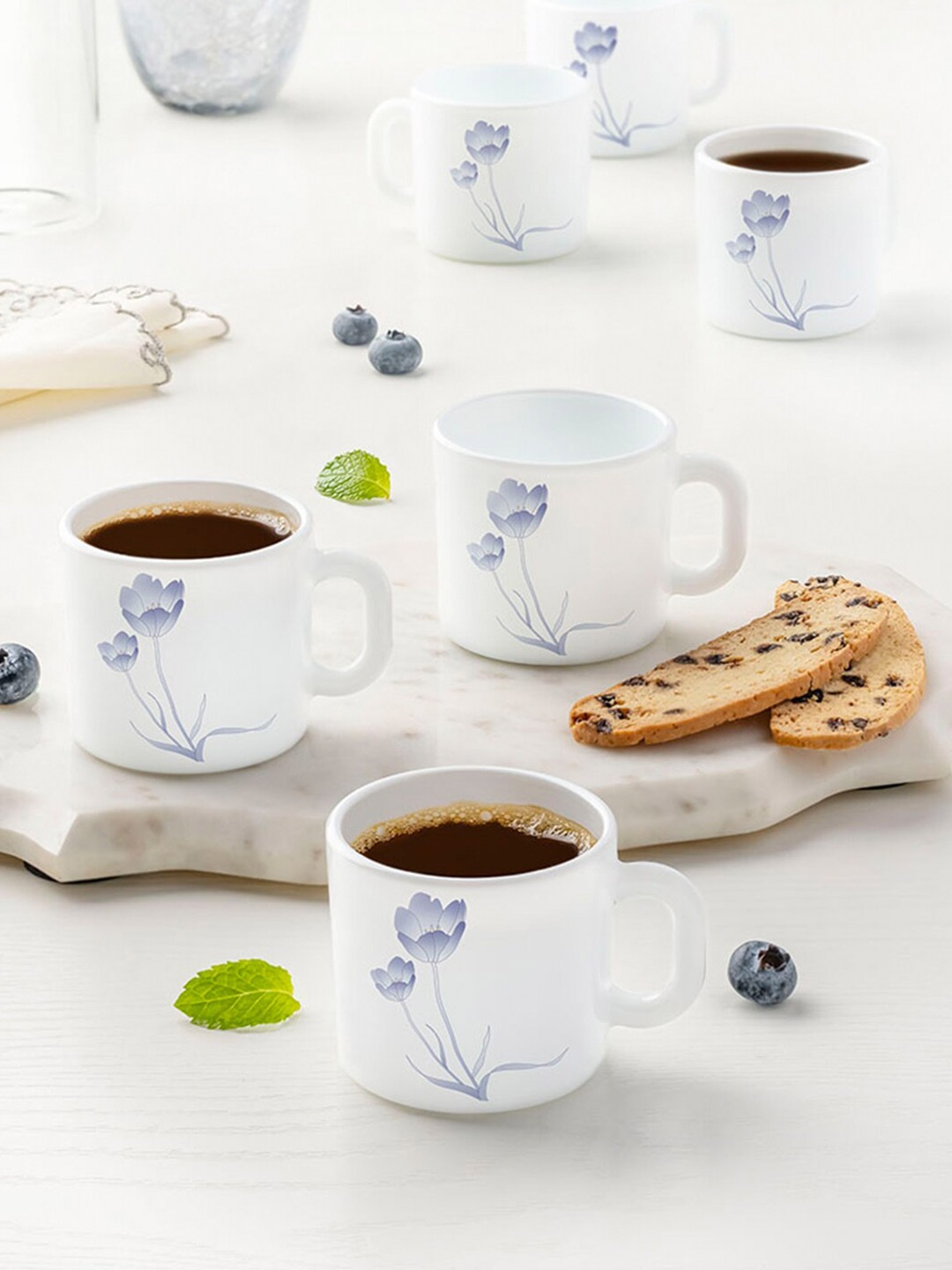 

Larah by BOROSIL White & Blue Printed Opalware Glossy Set of Cups and Mugs