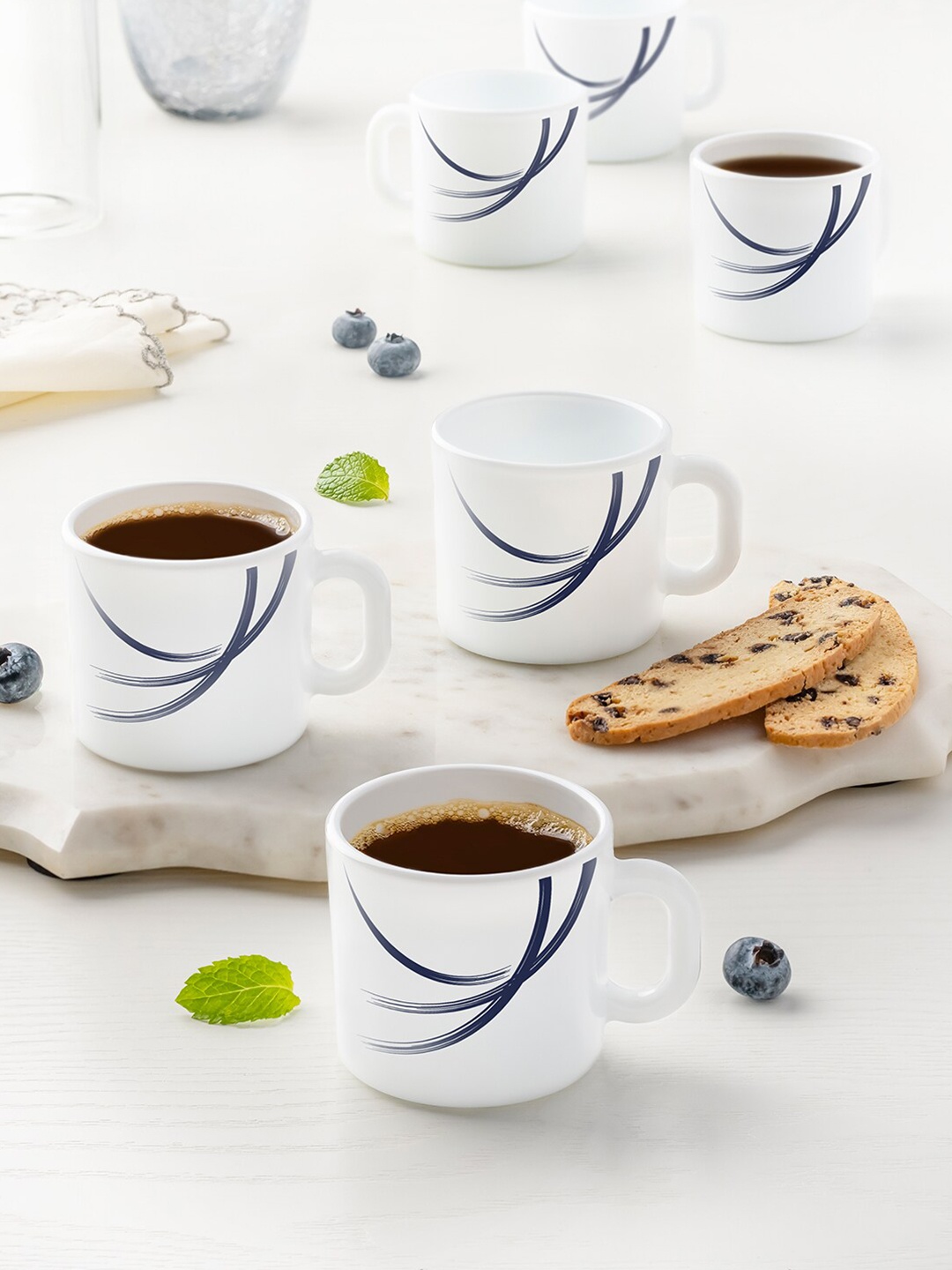 

Larah by BOROSIL White & Blue Printed Opalware Glossy Set of Cups and Mugs