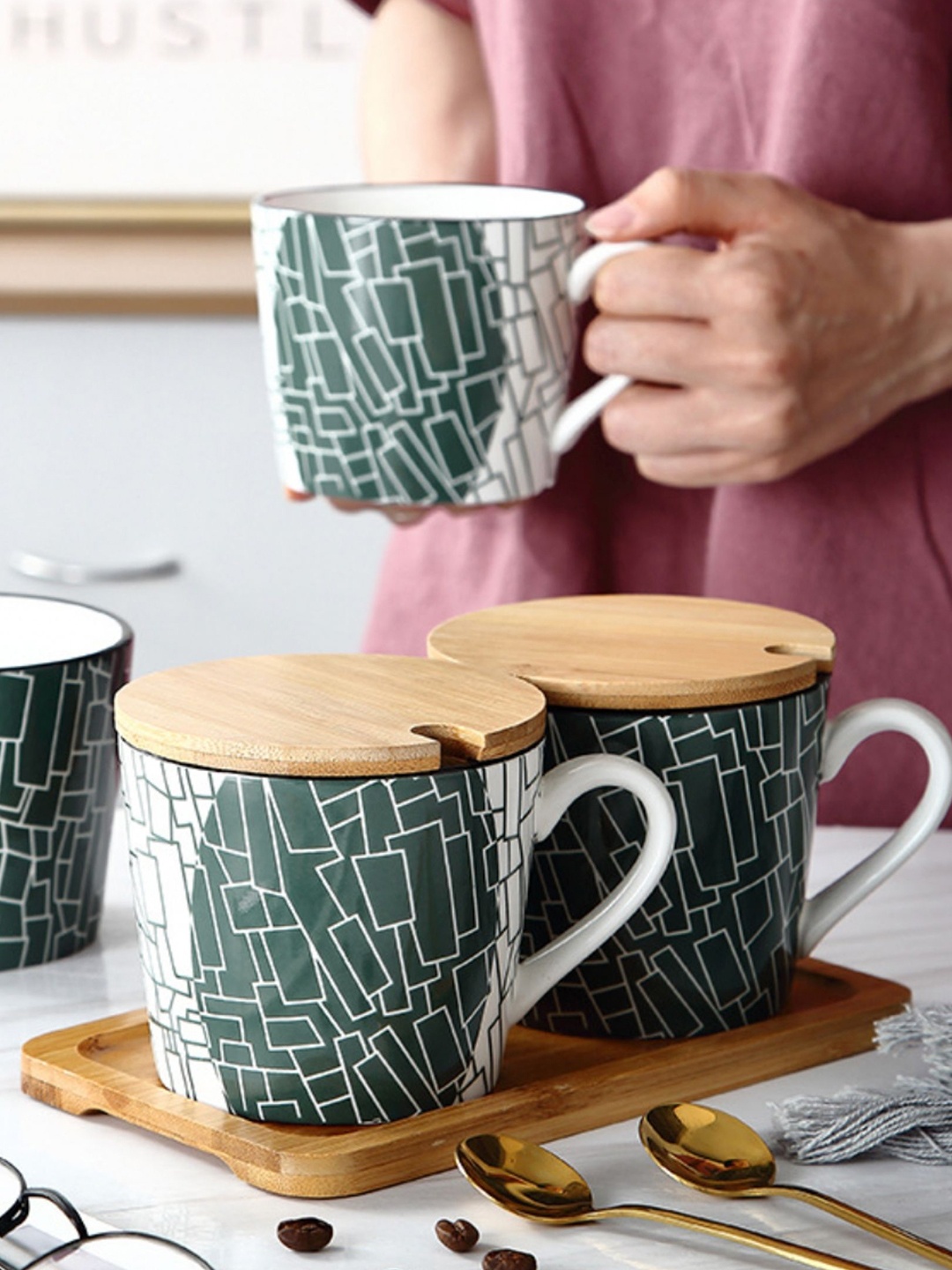 

Nestasia Green & White Geometric Printed Ceramic Cup with Lid