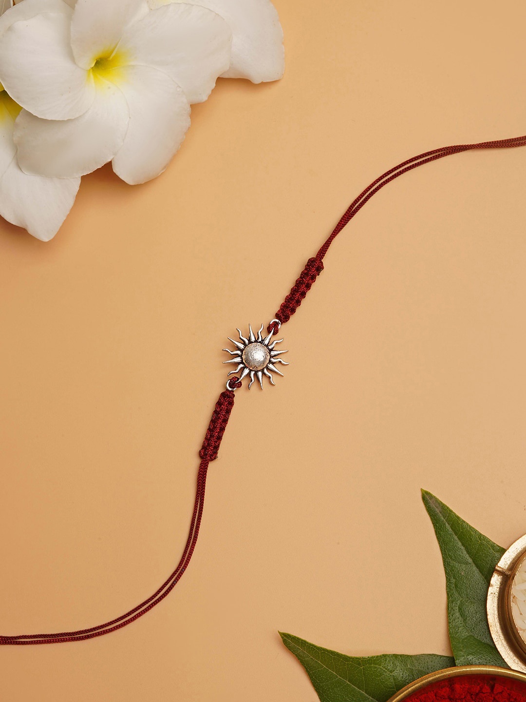 

TEEJH Men Silver-Toned & Red Threaded Rakhi