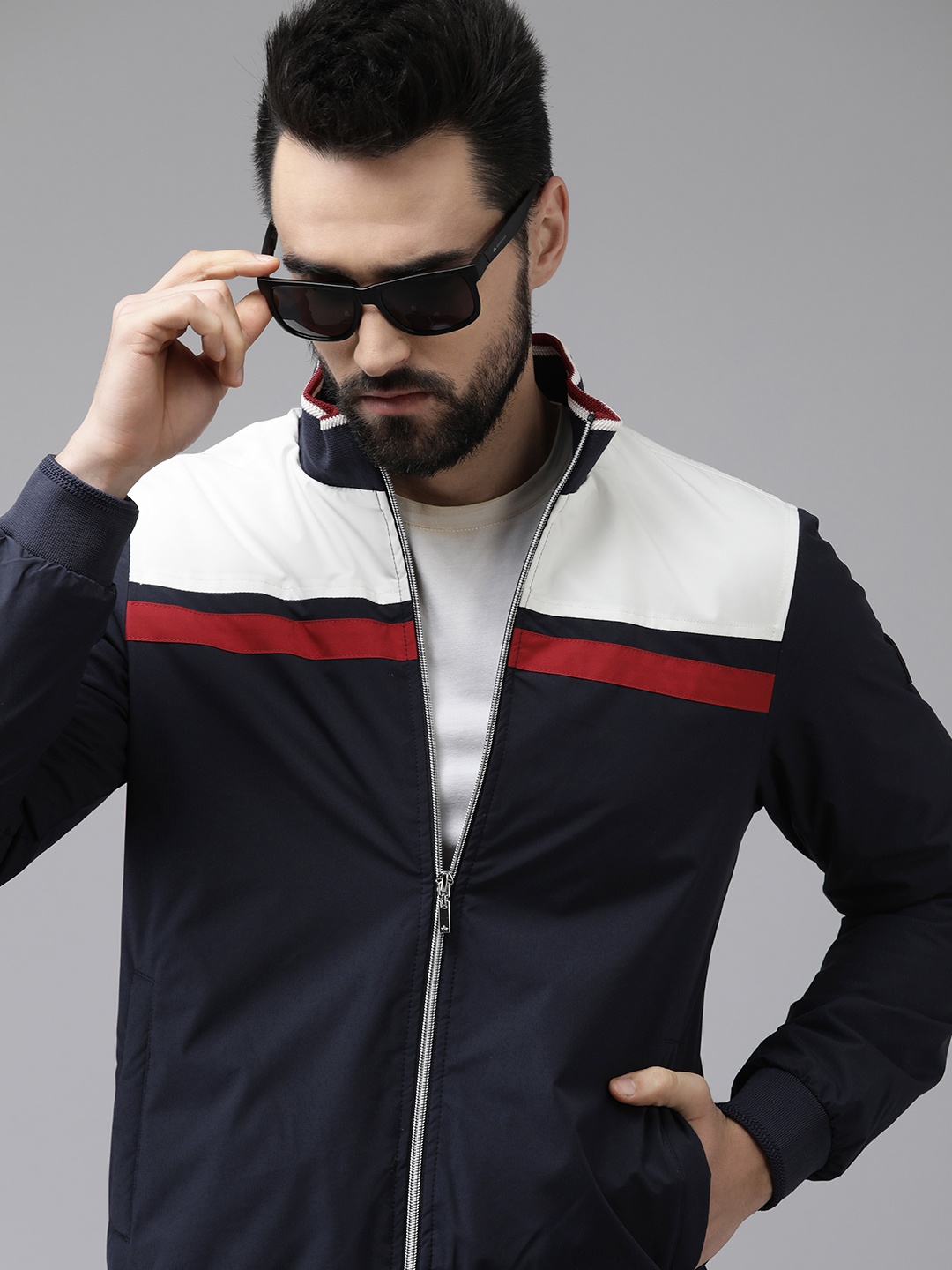 

Arrow Men Navy Blue & White Colourblocked Bomber Jacket