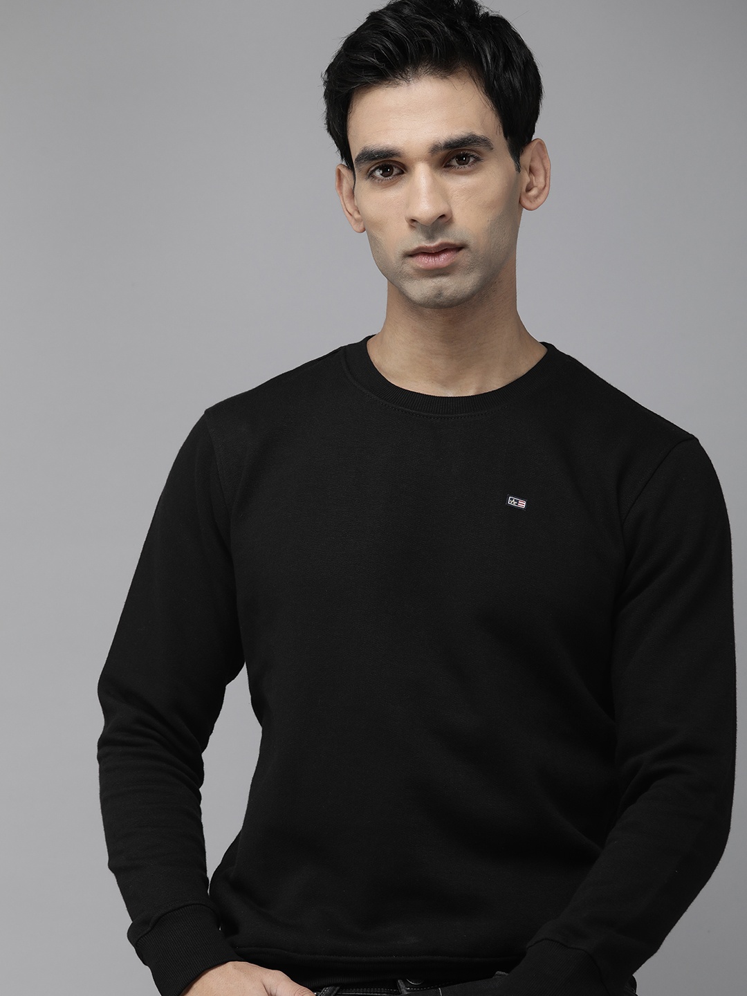 

Arrow Men Solid Round Neck Knitted Sweatshirt, Black