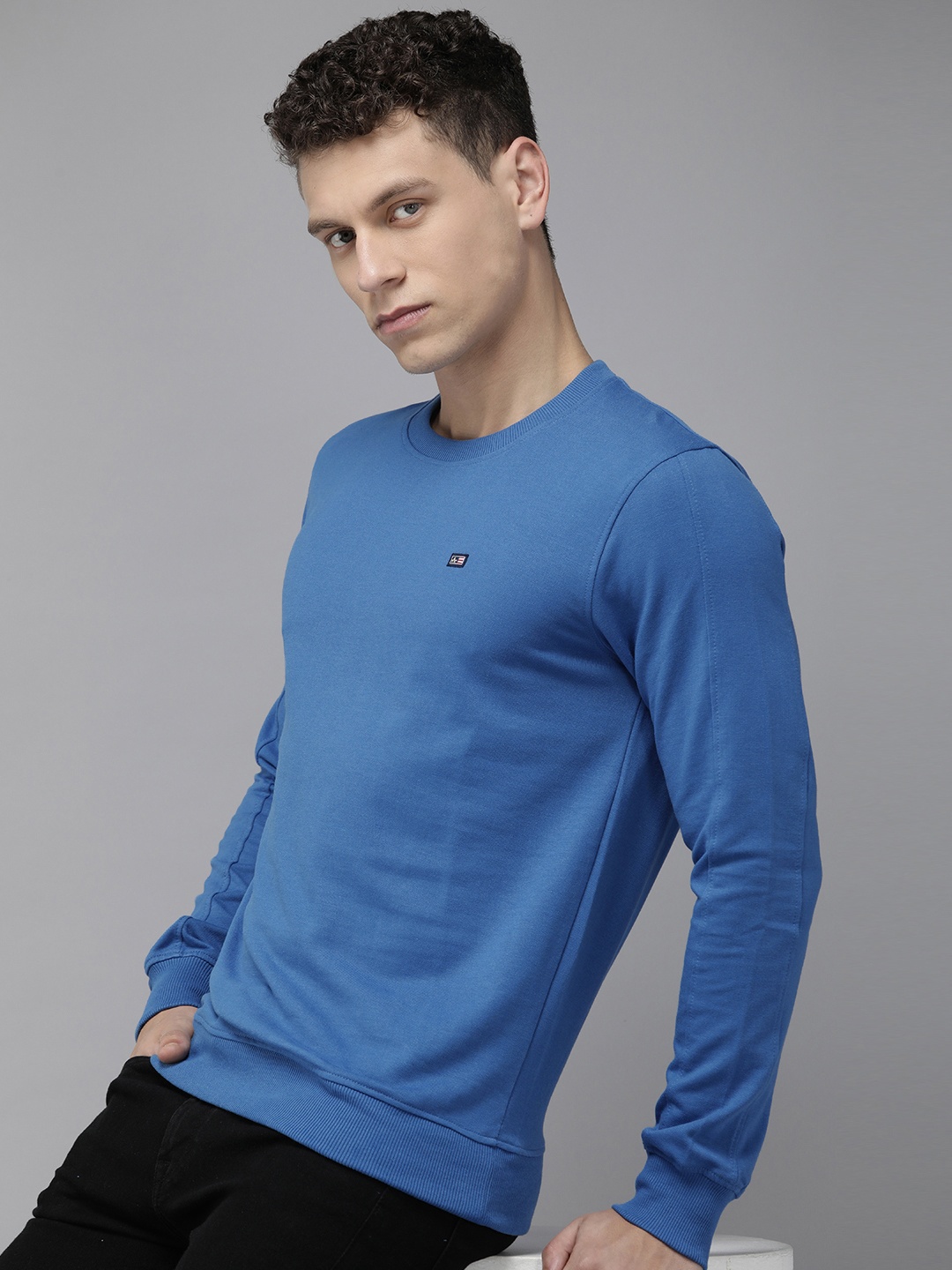 

Arrow Men Solid Round Neck Knitted Sweatshirt, Blue