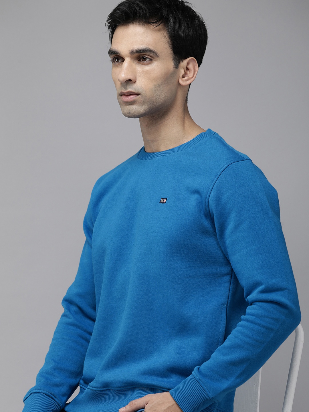

Arrow Men Solid Round Neck Knitted Sweatshirt, Blue