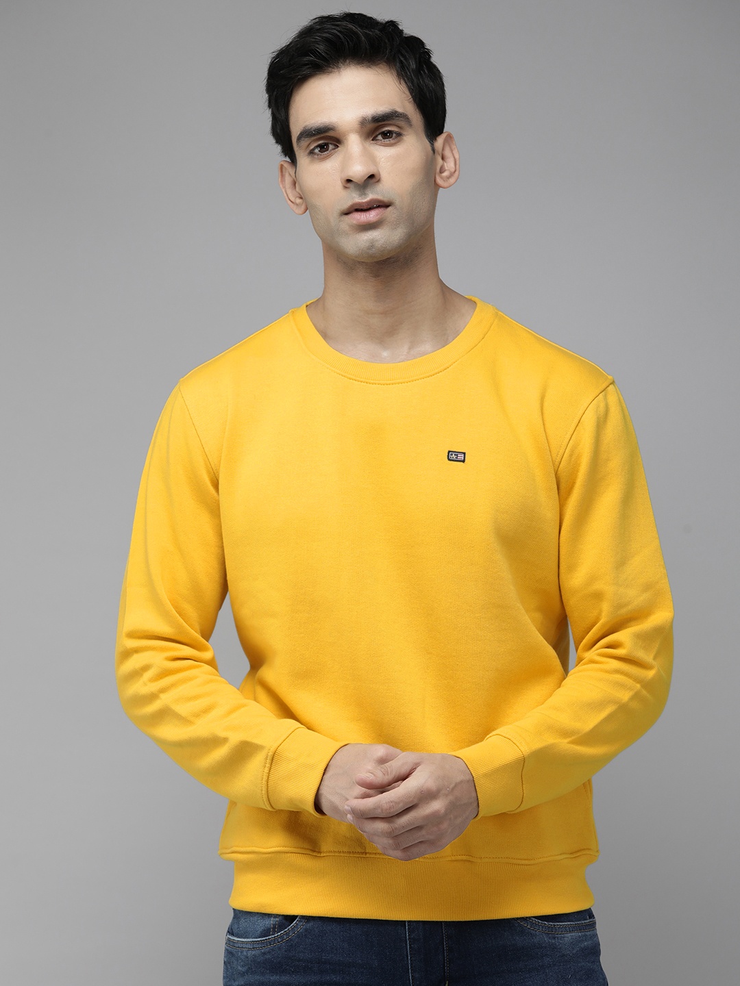 

Arrow Men Solid Round Neck Knitted Sweatshirt, Yellow