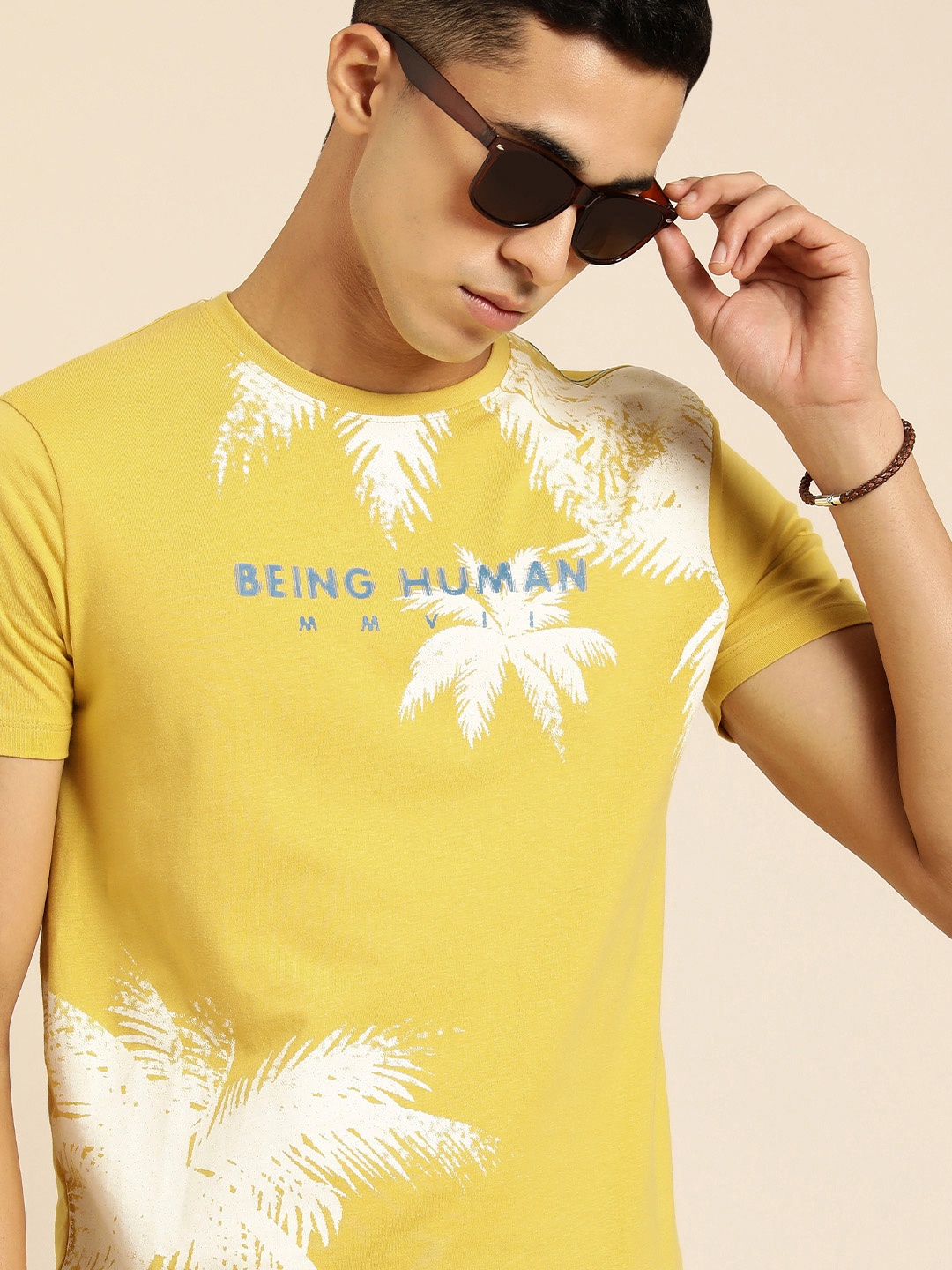 

Being Human Men Yellow Brand Logo Printed Pure Cotton T-shirt