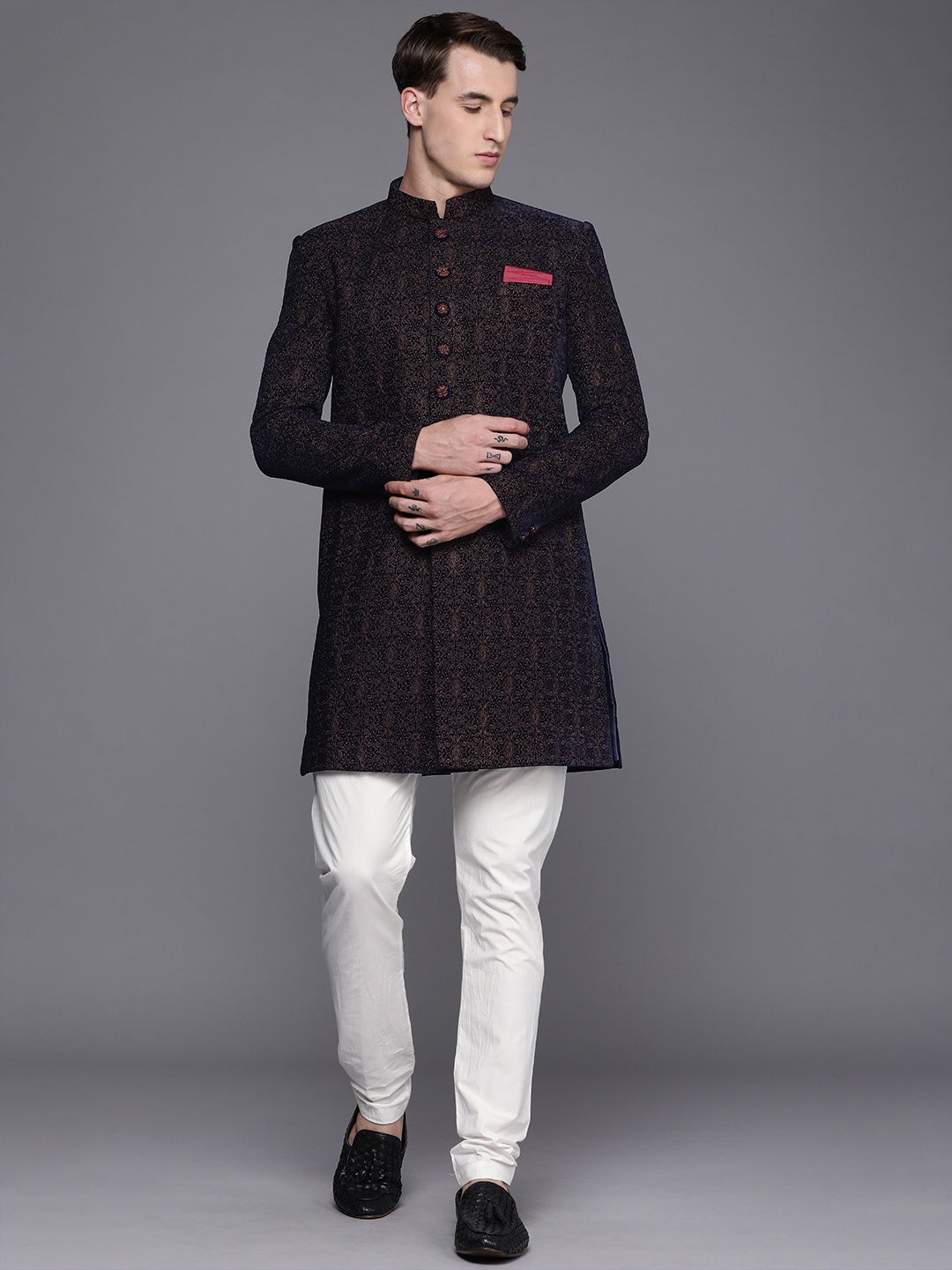 

Manyavar Men Navy Blue Embroidered Velvet Sherwani Set