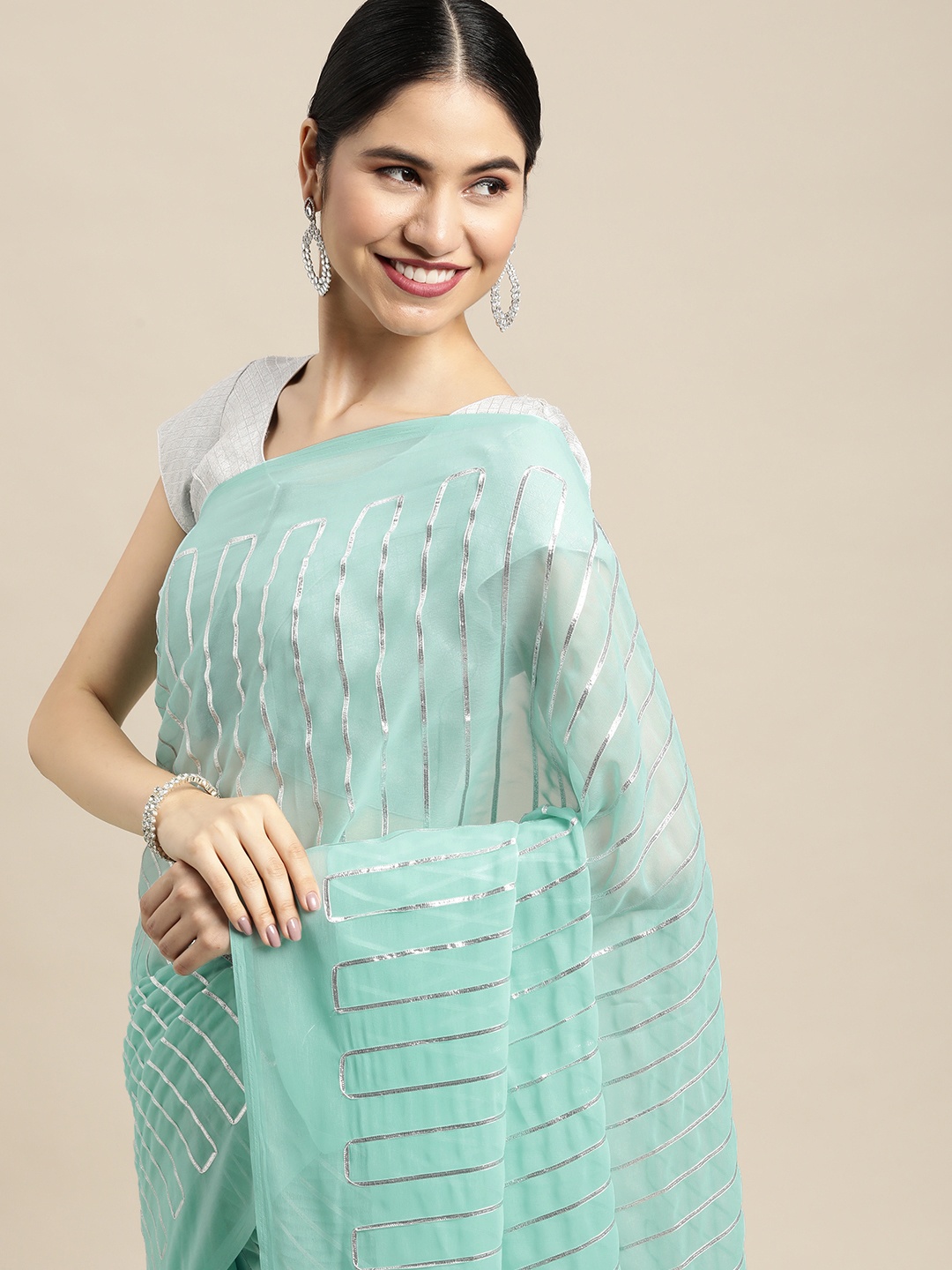 

Mitera Blue & Silver Striped Gotta Patti Saree