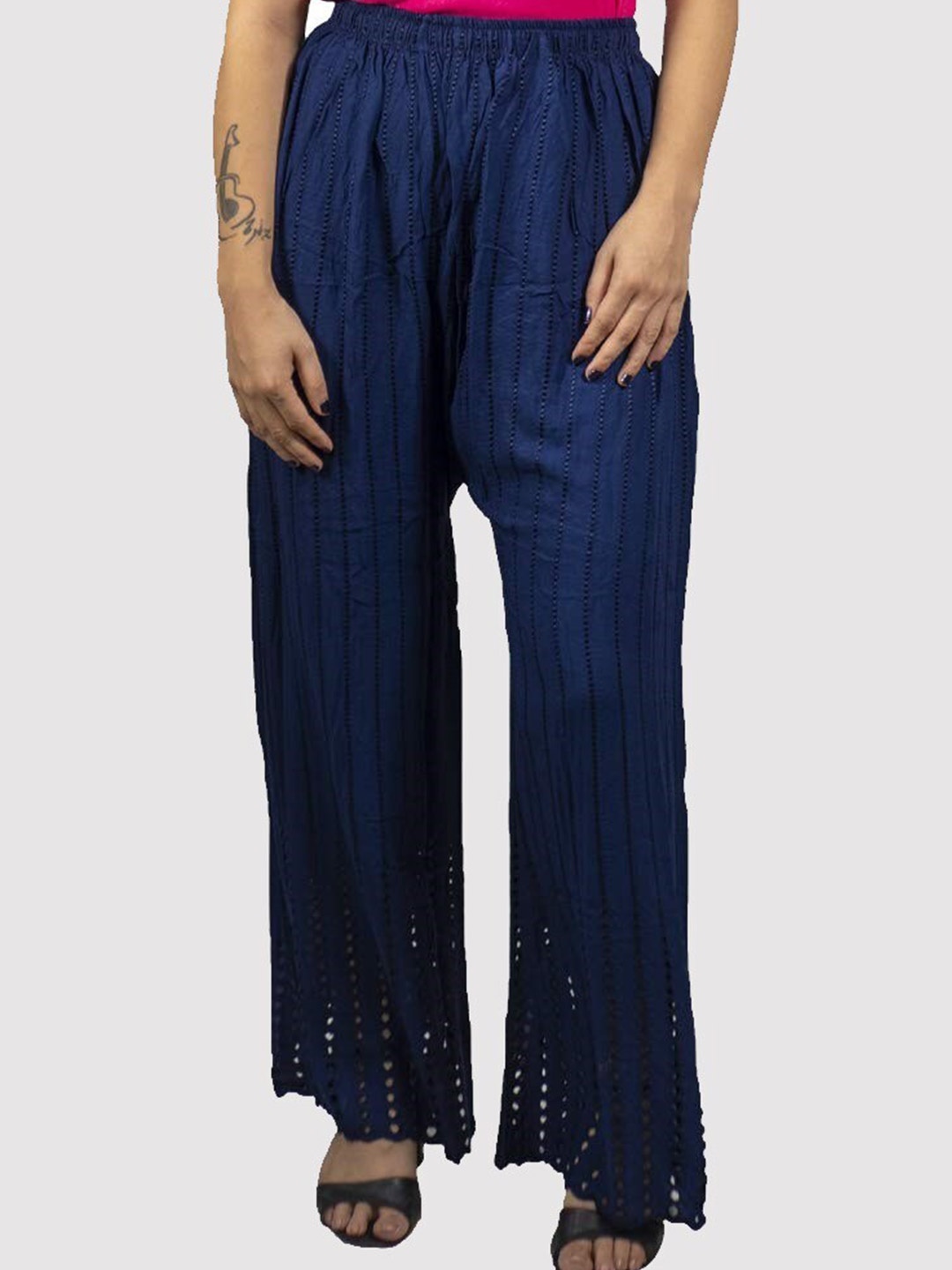 

Trendzmy Women Navy Blue Embroidered Flared Palazzos