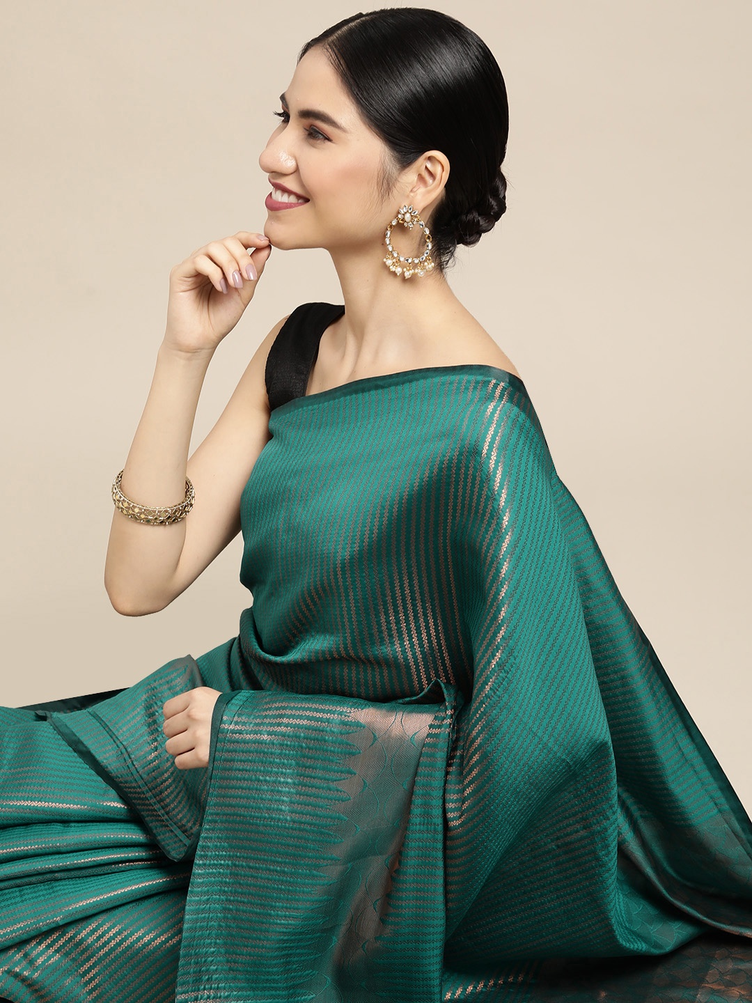 

Mitera Green & Copper Striped Zari Kanjeevaram Saree