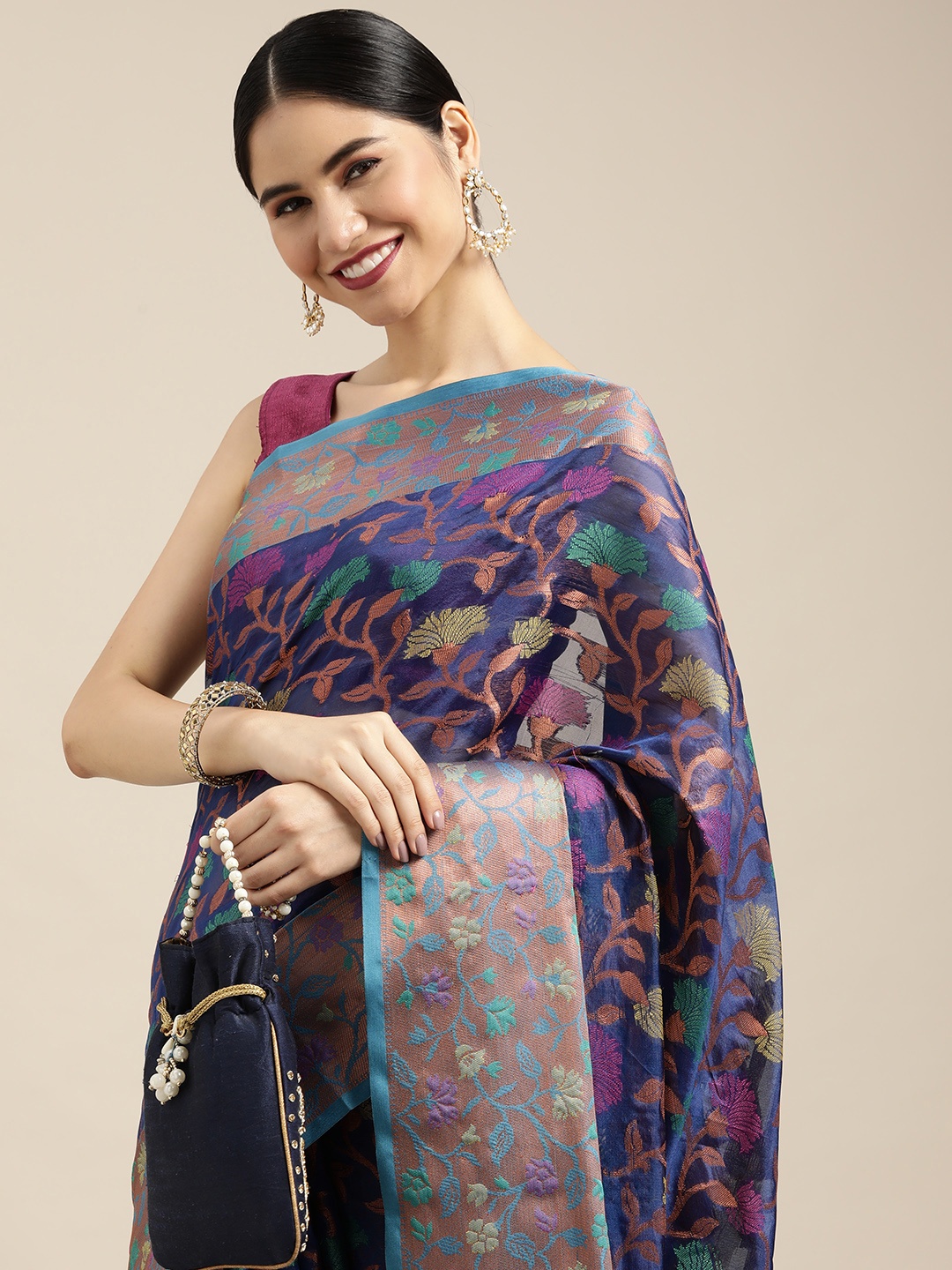 

Mitera Blue & Green Floral Zari Organza Kanjeevaram Saree