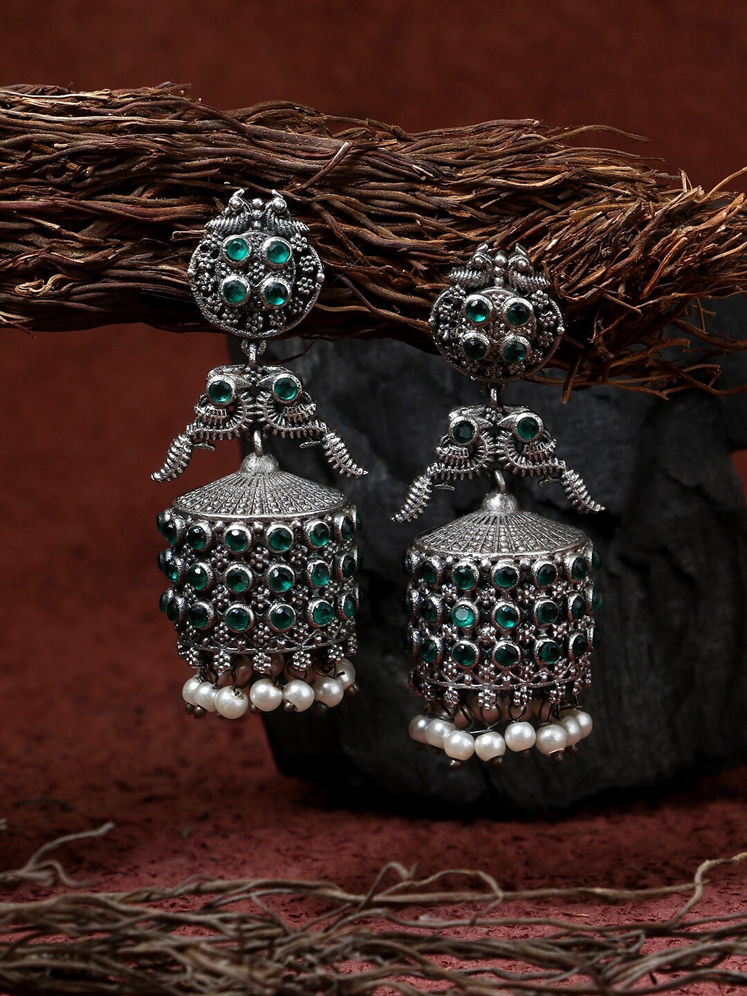 

Adwitiya Collection Silver-Toned Peacock Shaped Jhumkas Earrings