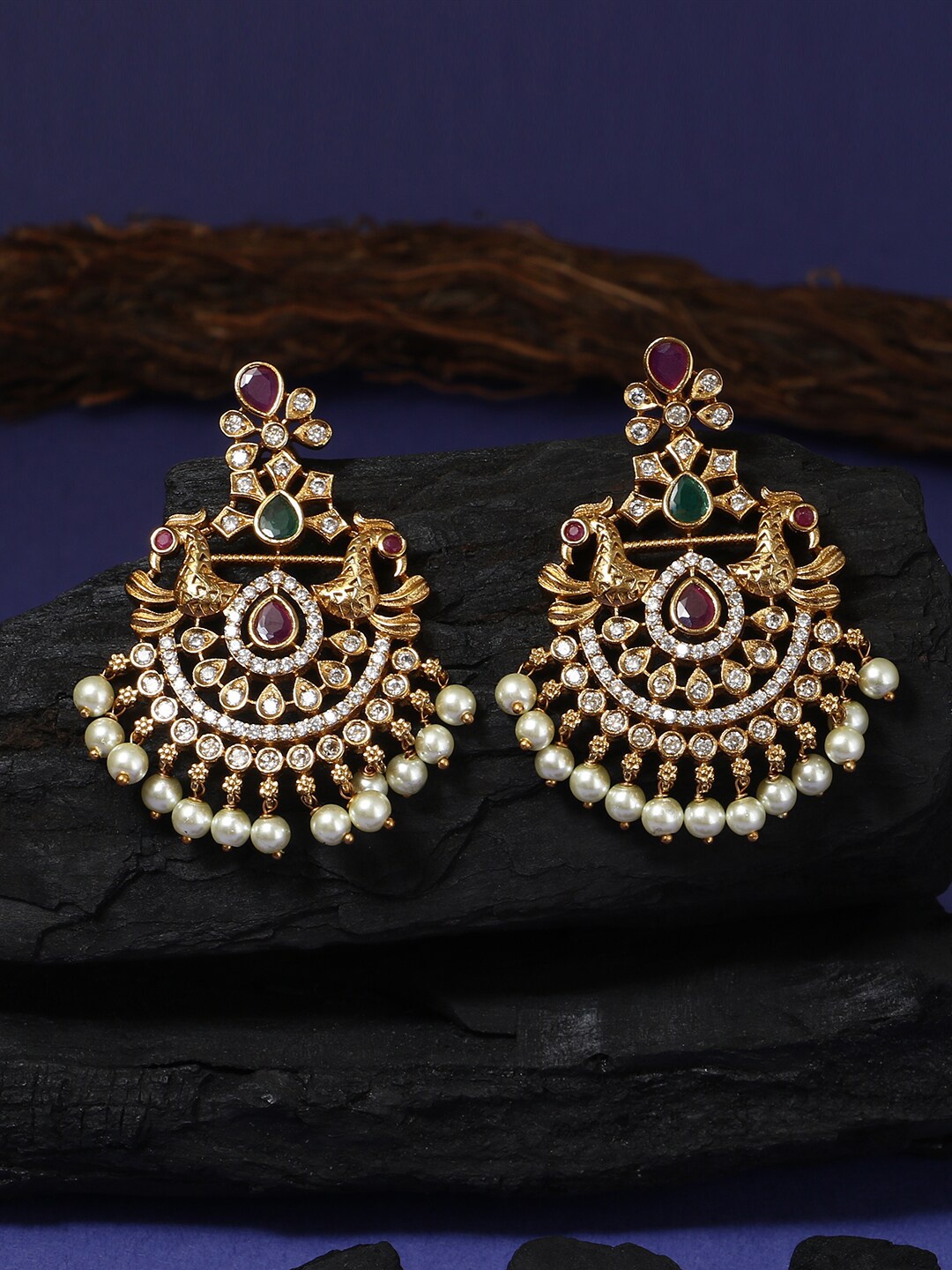 

Adwitiya Collection Gold-Toned & White Peacock Shaped Chandbalis Earrings