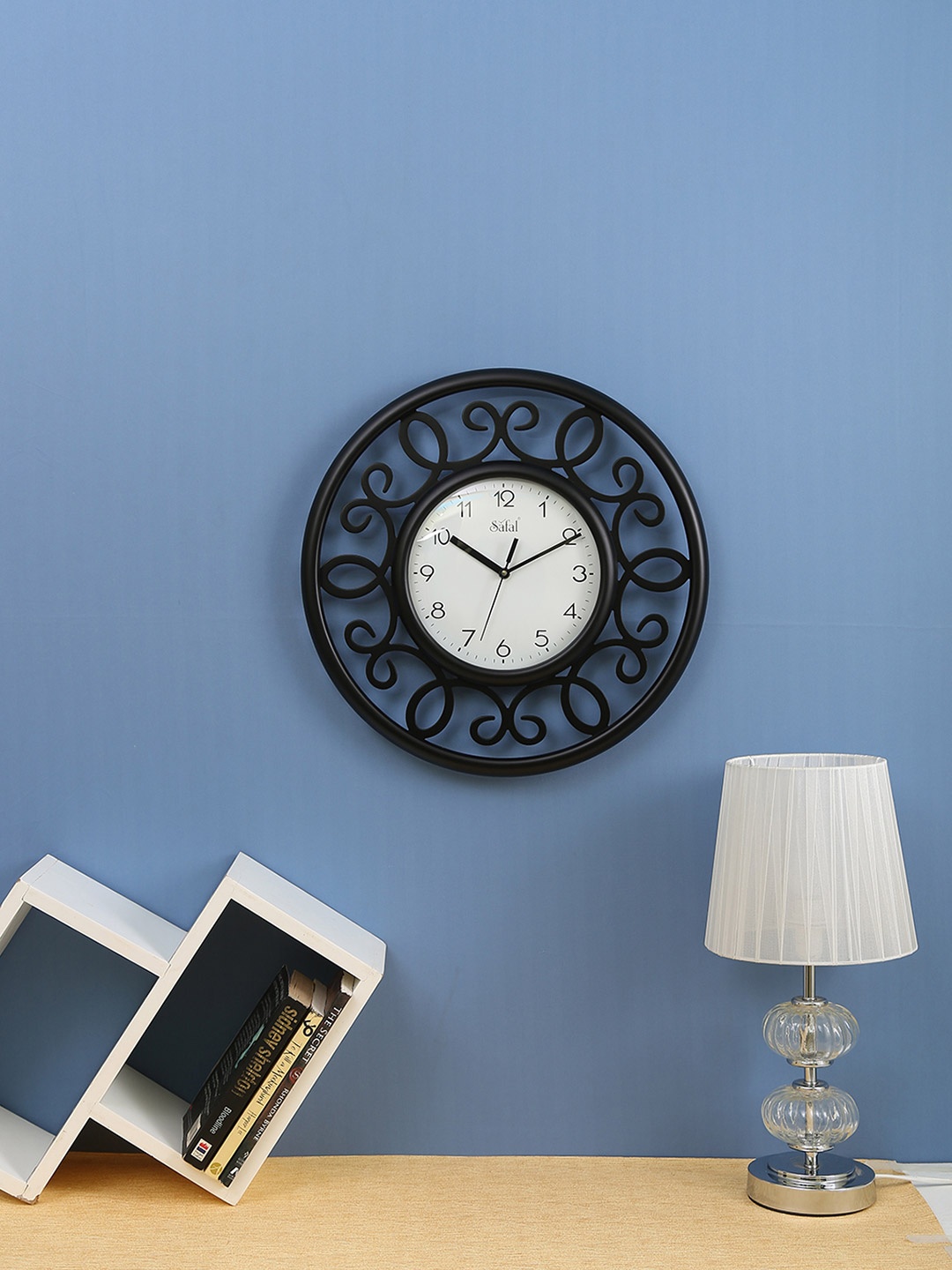 

Safal White & Black Solid Dial Round Analogue Wall Clock