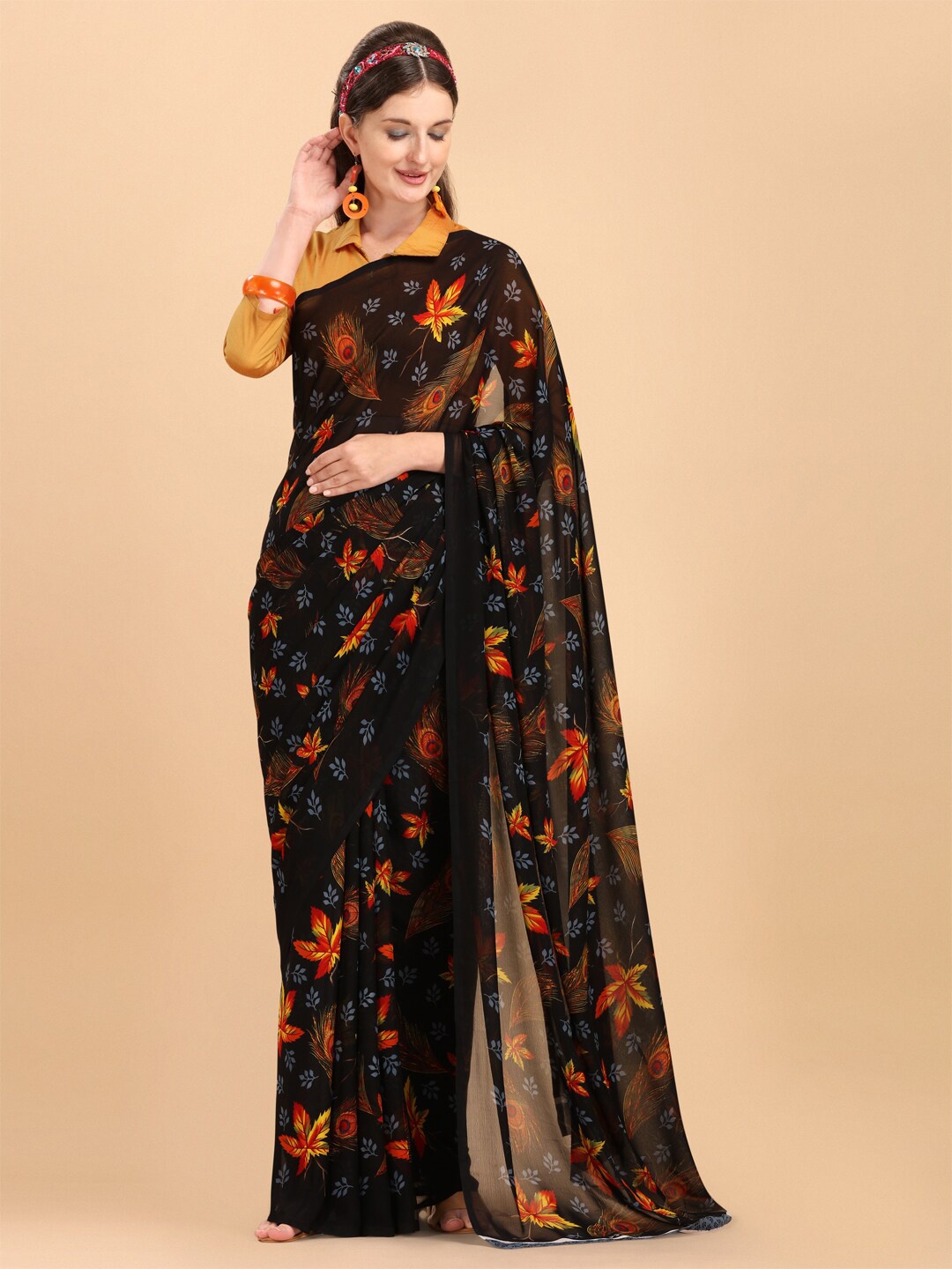 

Sangria Black & Orange Floral Pure Georgette Saree